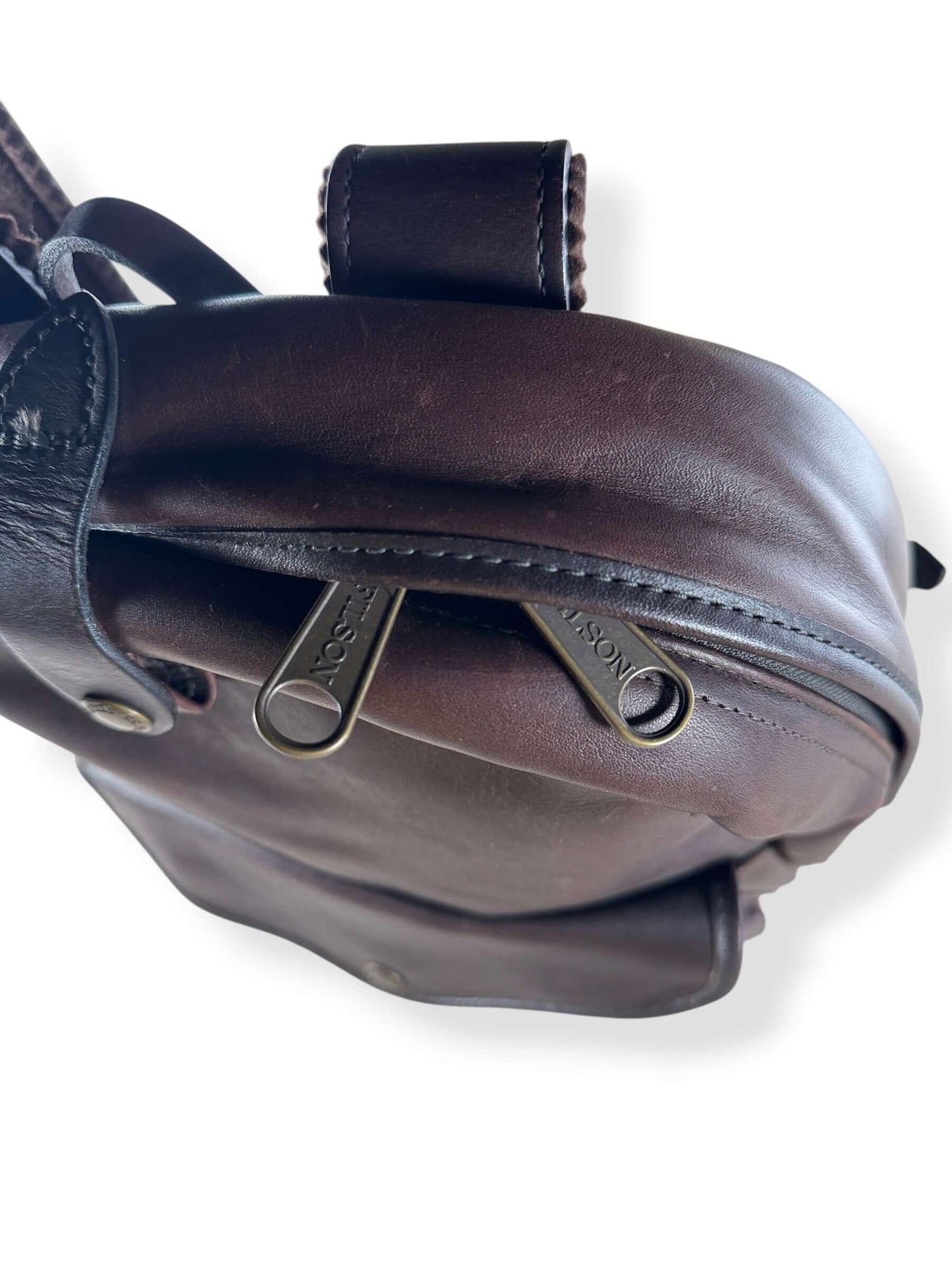 Zippers on Filson Weatherproof Sierra Brown Leather Journeyman Backpack