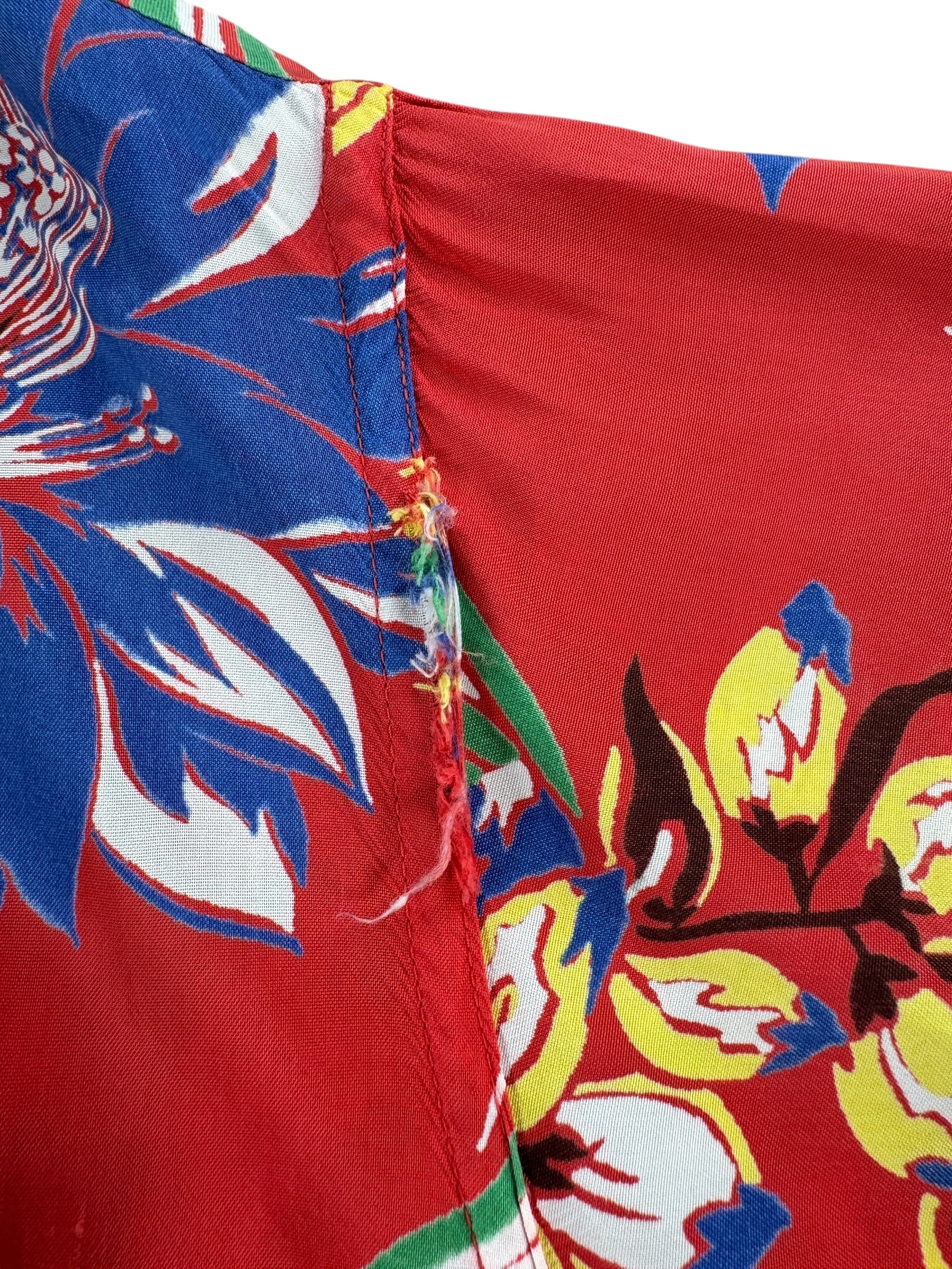 Distressing on Vintage Made in California Red Floral Rayon Aloha Shirt SZ M