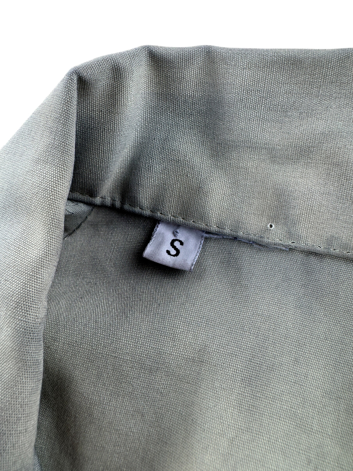 Size tag on Vintage Purdue Shoemakers Jacket SZ S