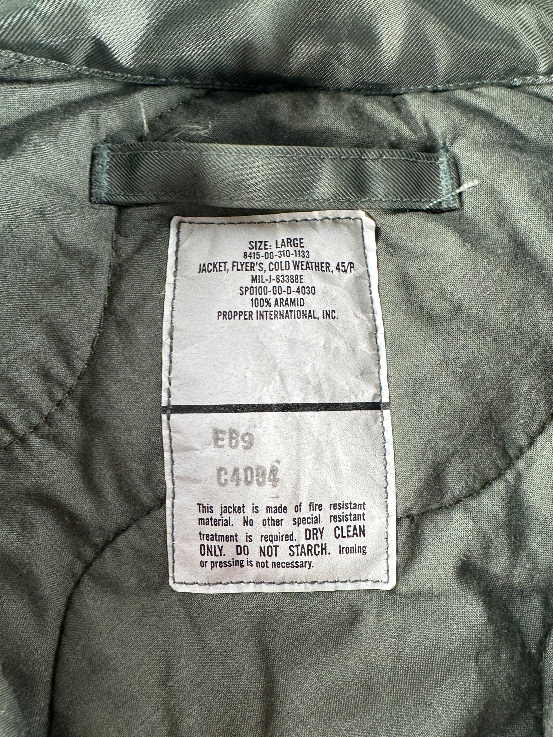 Label on Vintage '00 Cold Weather Flyers Jacket SZ L
