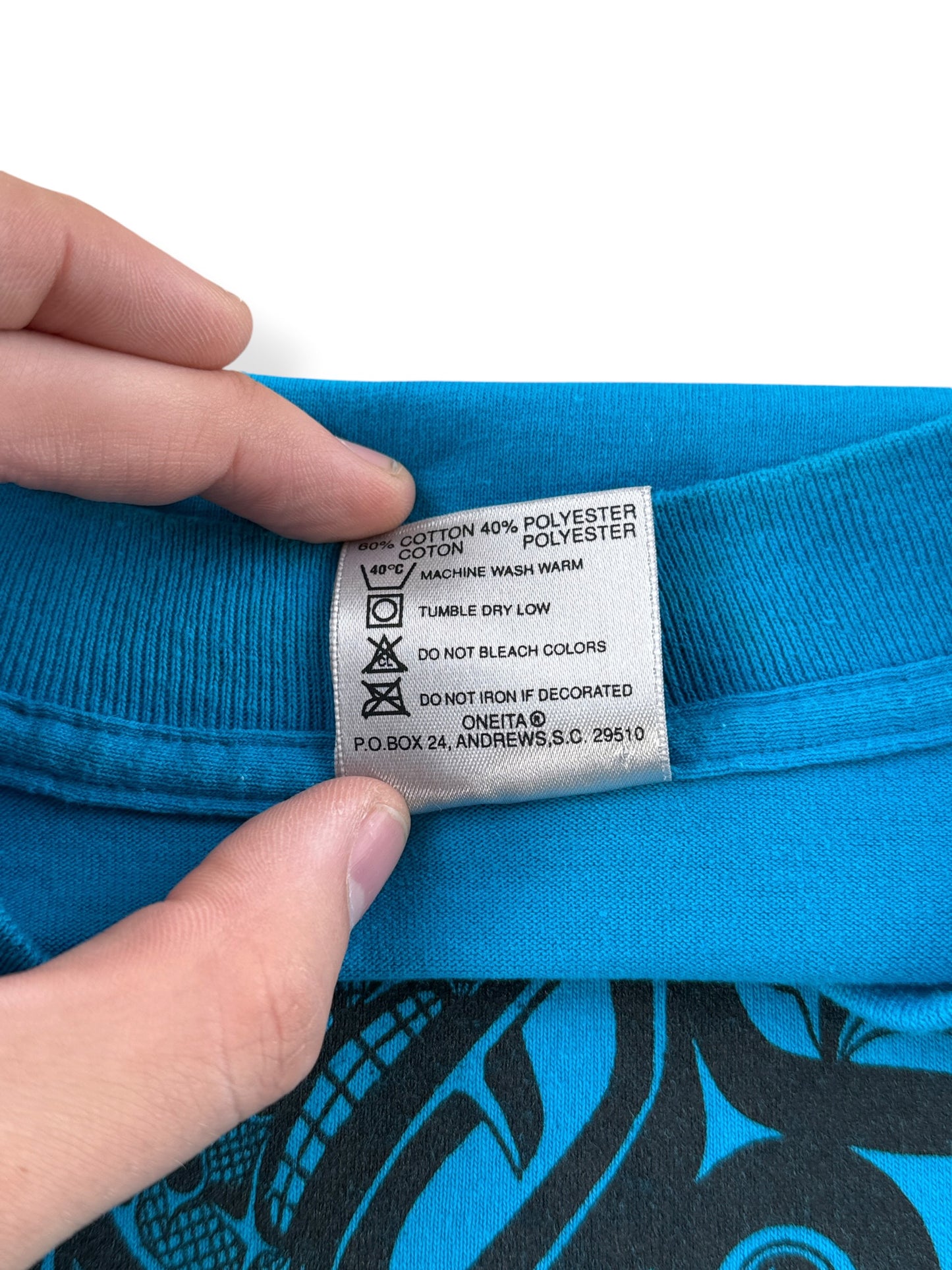 Back of tag on Vintage Blue 1990 First Nations Orca Tee SZ L (Fits M)
