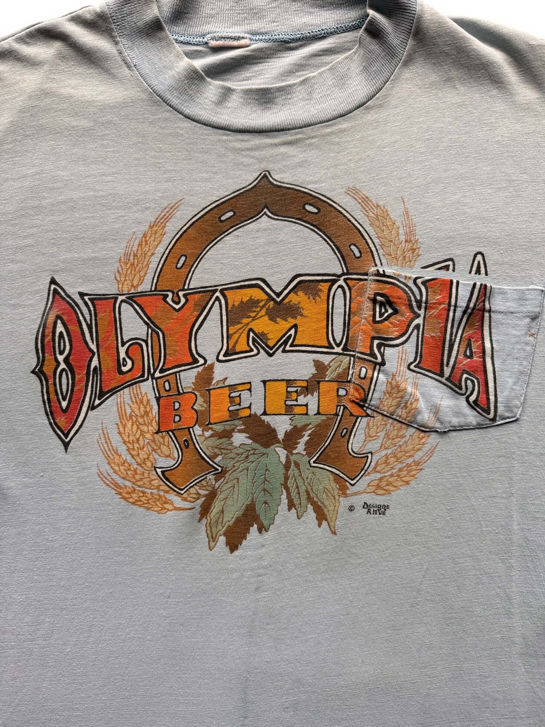 front graphic of Vintage Olympia Beer Two-Sided Pocket Tee SZ L