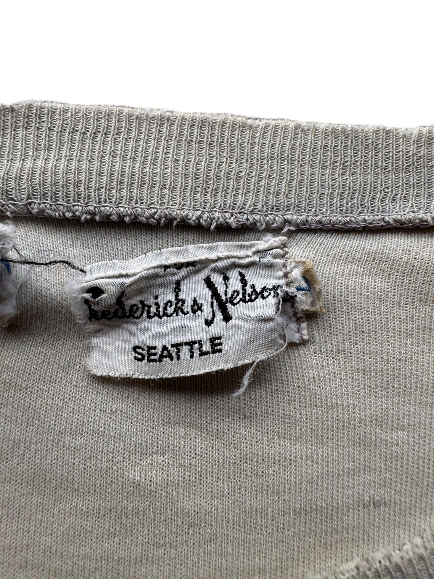 tag on Vintage Well-Loved Frederick & Nelson Blank Tee SZ L