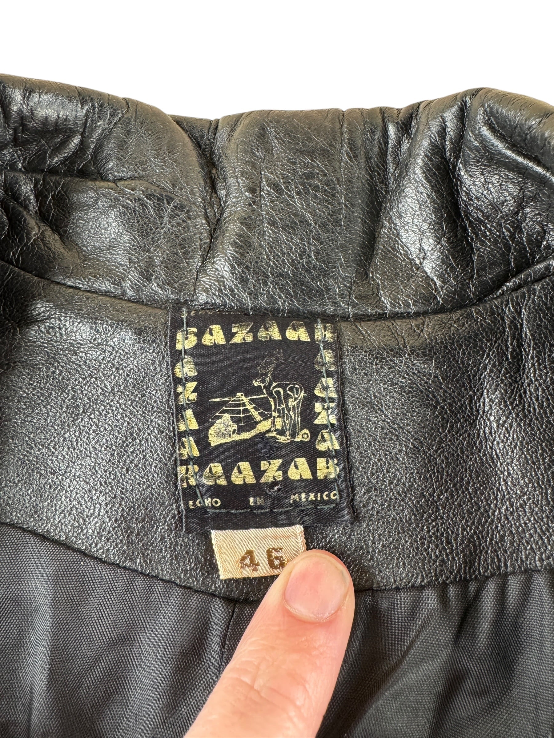 Label on Vintage 70s Black Leather Trench Coat SZ 46