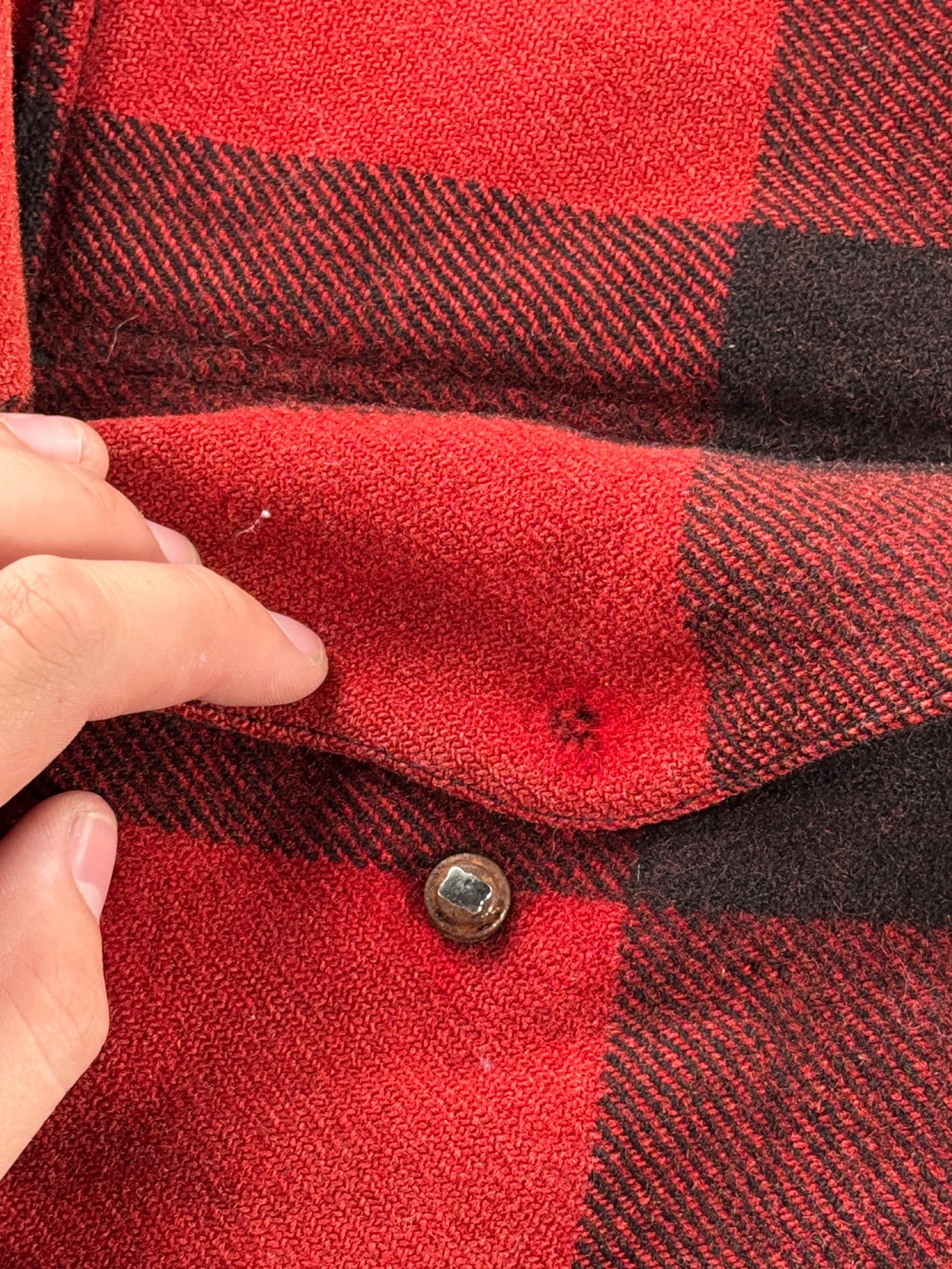 Damaged pocket button on Vintage 80’s Filson Double Mackinaw SZ 44