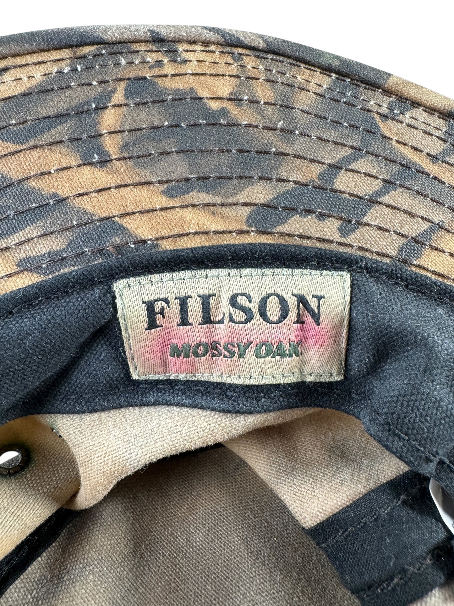 Label on Modern Filson Mossy Oak Tin Cloth Hat SZ L