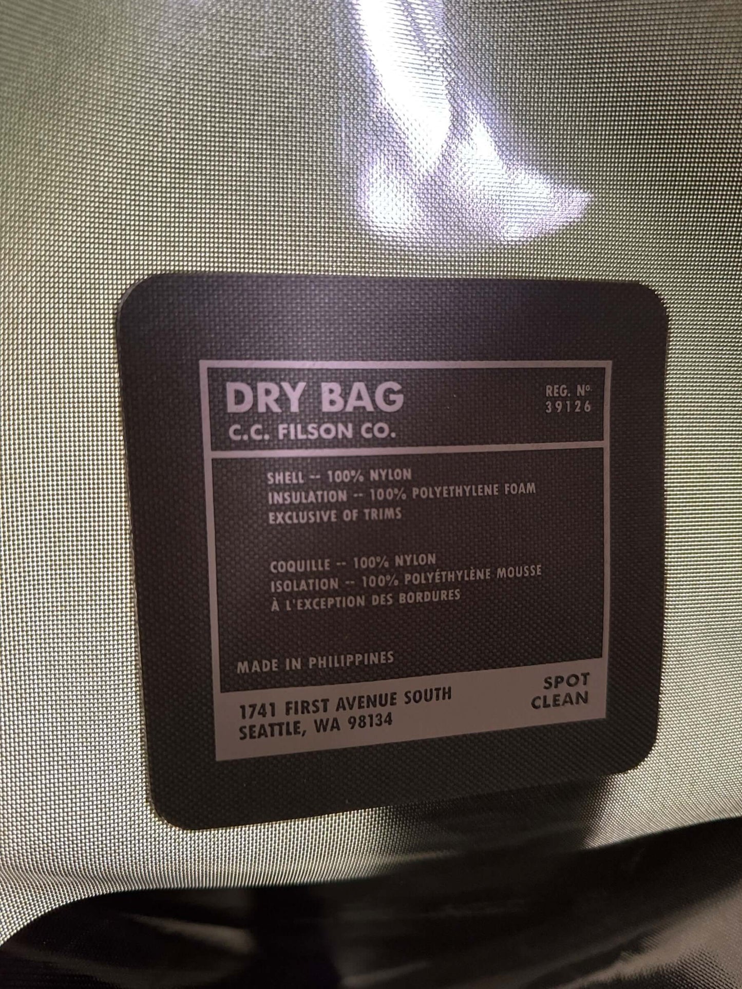 Inner label of Filson NWT Green Dry Backpack