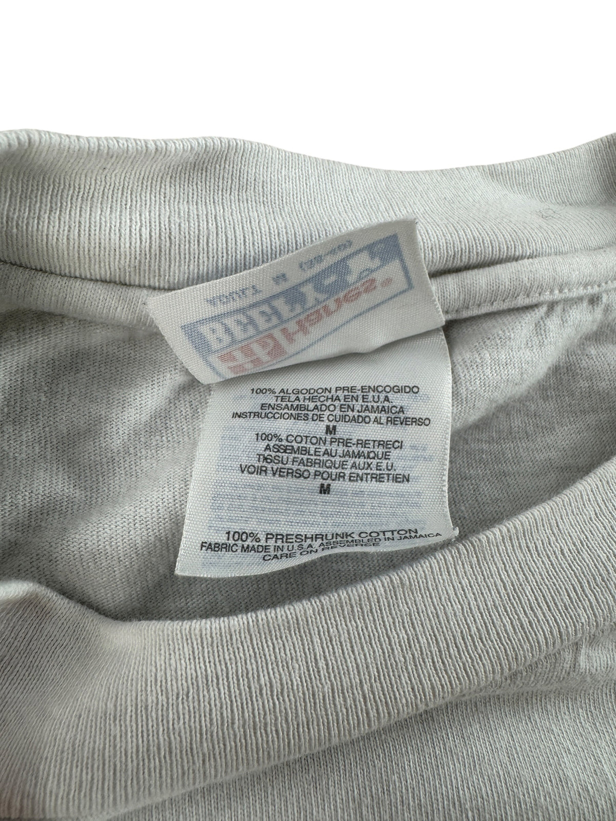 Other Side of Tag on Vintage 90s Swim With The Fish Fish Tee SZ M