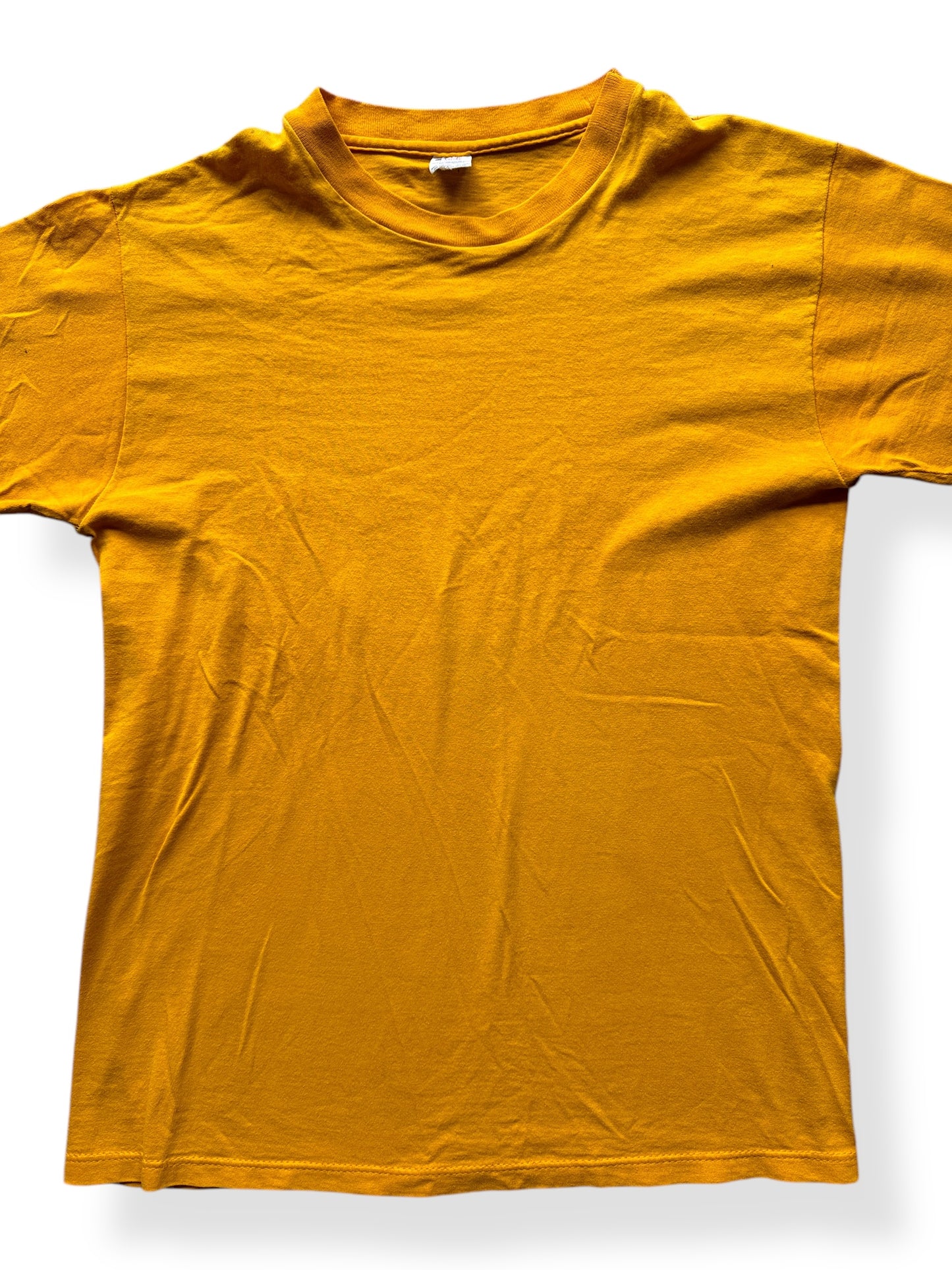 Front Close Up of Vintage Champion Blue Bar Mustard Blank Tee SZ L