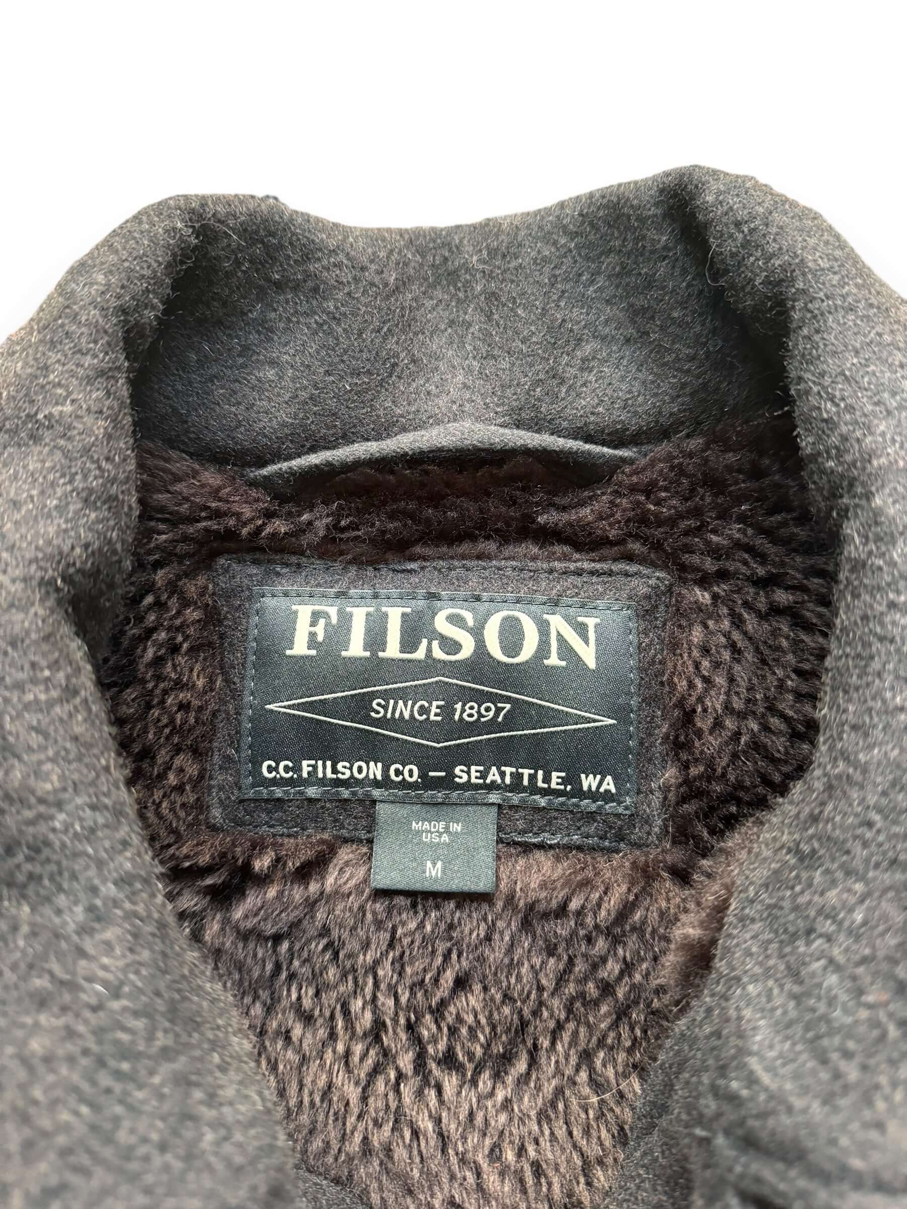 tag on Filson Black Wool Lined Cape Coat SZ M