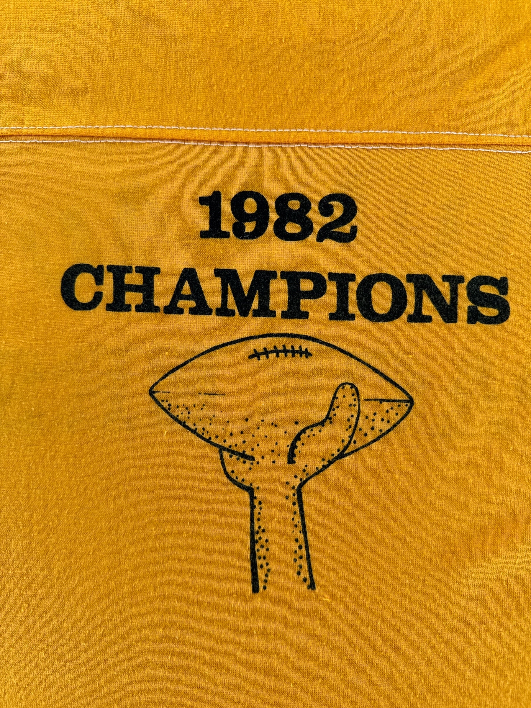 Back Graphic of Vintage Juneau Packers Yellow Jersey SZ S