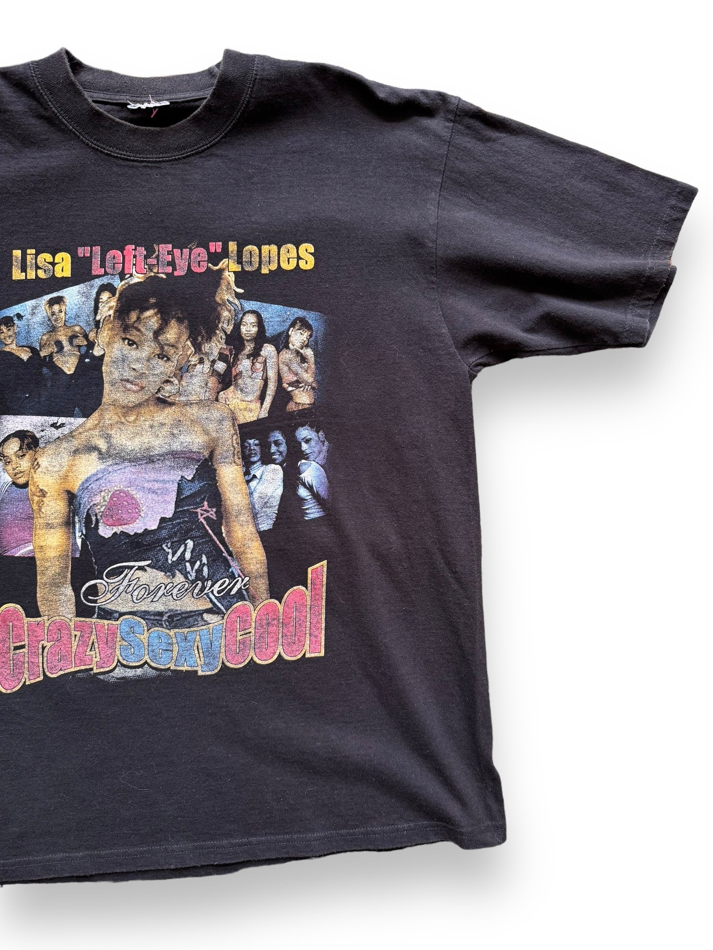 front left of Vintage Lisa "Left-Eye" Lopez TLC Memorial Rap Tee SZ L