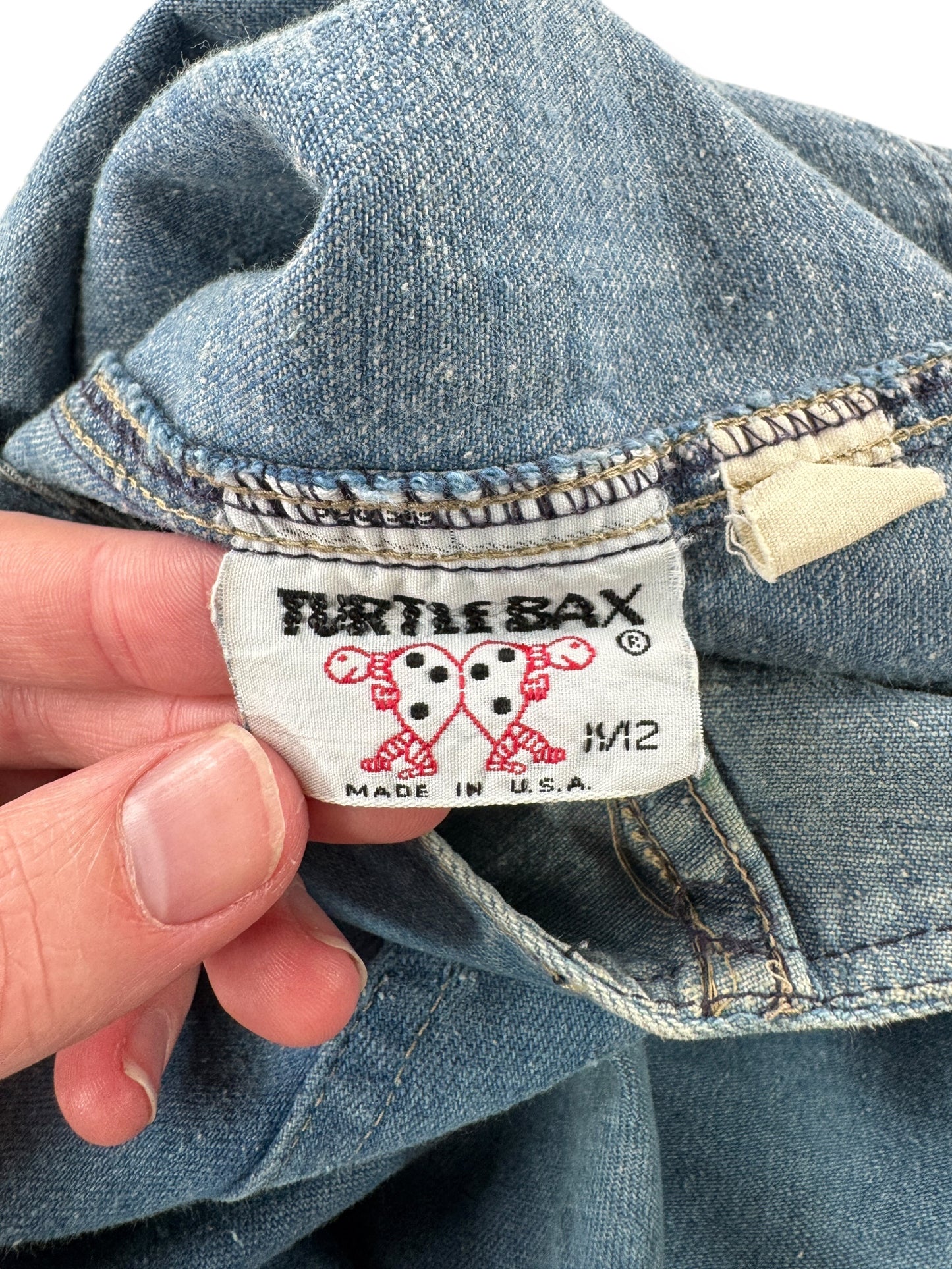 Tag on Vintage Turtle Bax Denim Flares W29