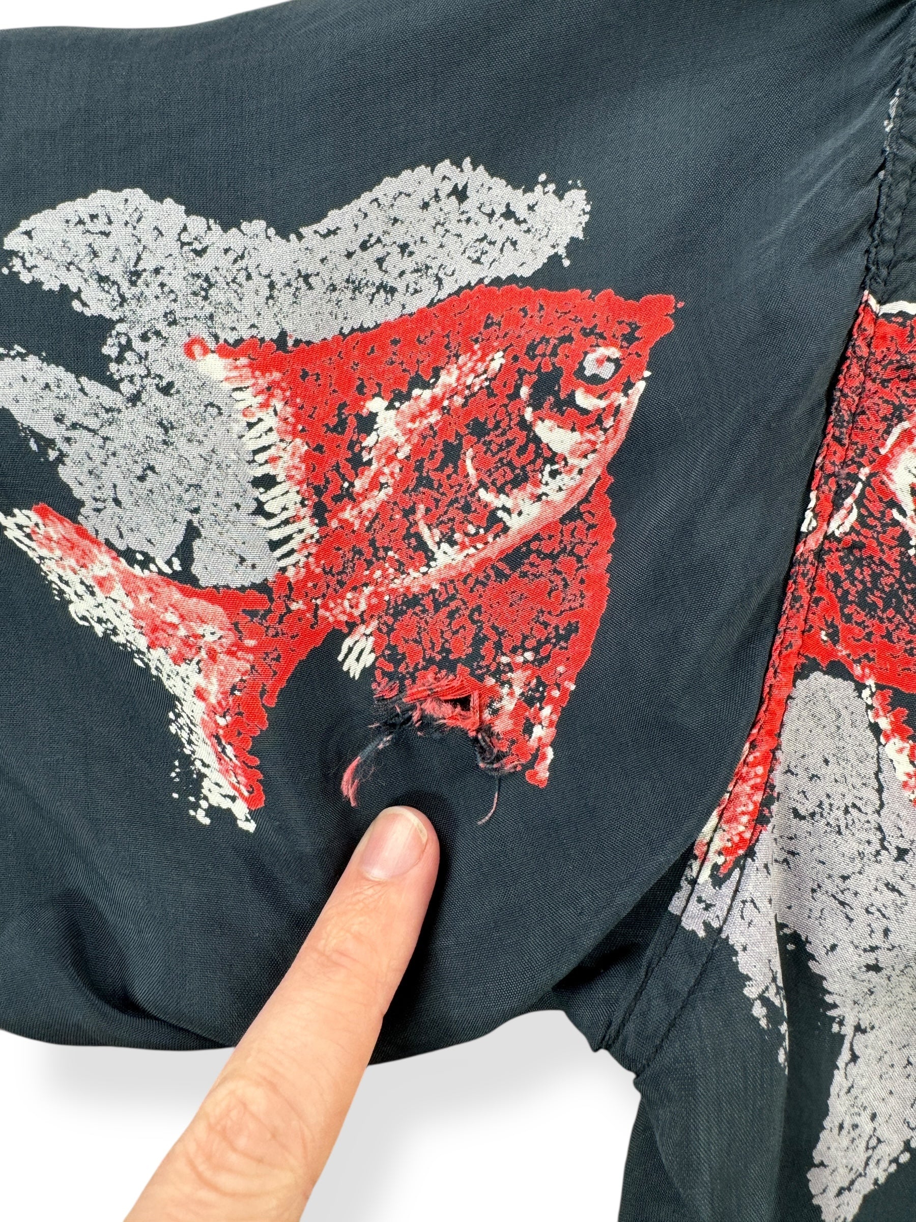 Hole on Back Left Sleeve of Vintage Made in California Fish Pattern Aloha Shirt SZ L AS IS