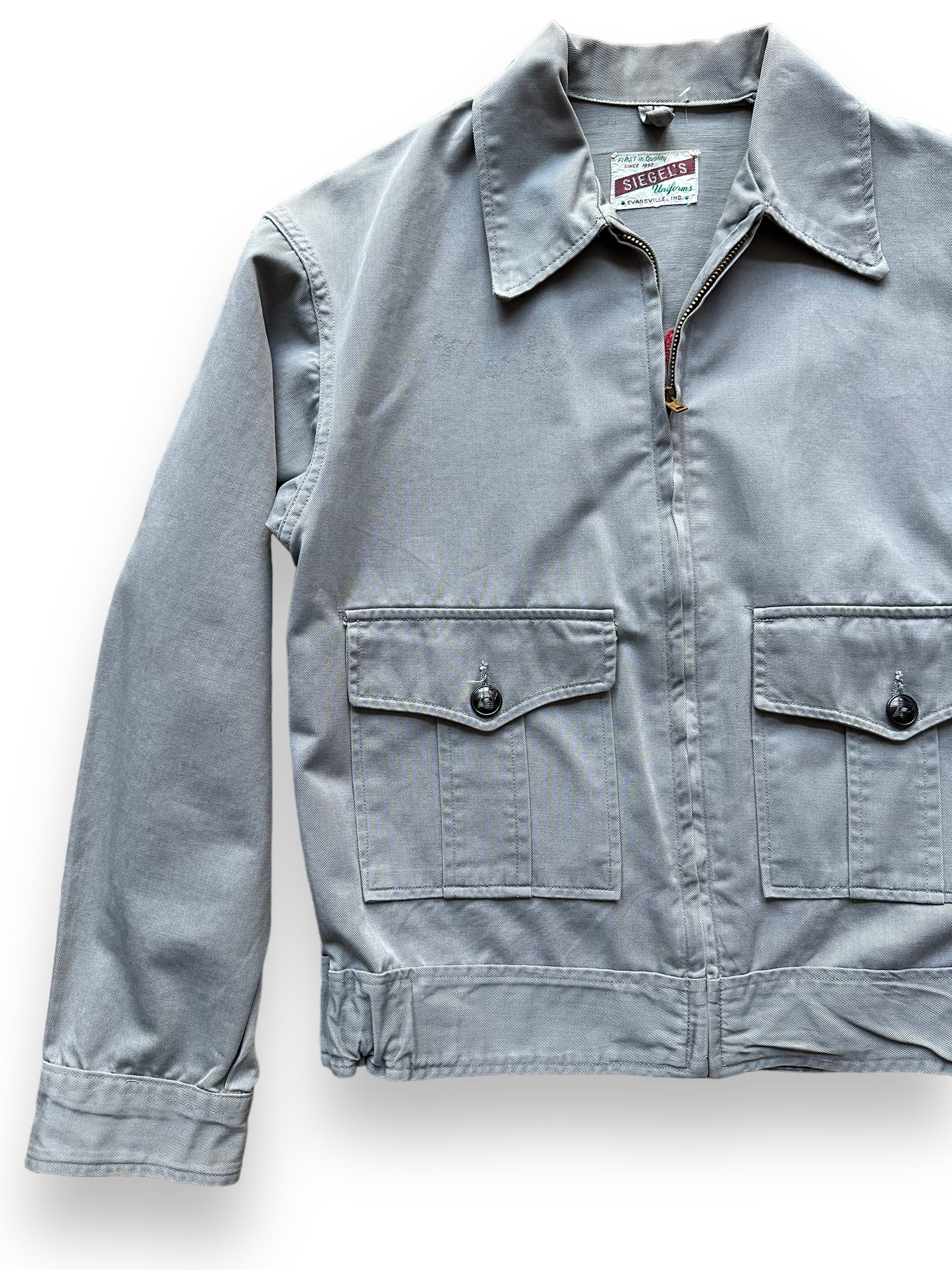 Front Right View of Vintage Grey Chainstitched Siegels Uniform Workwear Jacket SZ M | Vintage Workwear Seattle | Barn Owl Vintage Goods