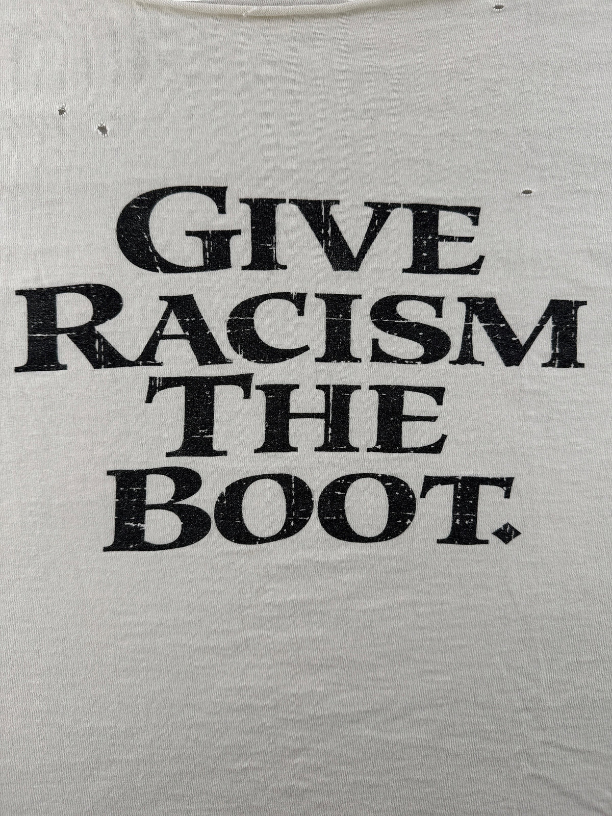 Front graphic on Vintage Thrashed Give Racism The Boot Timberland Tee SZ XL