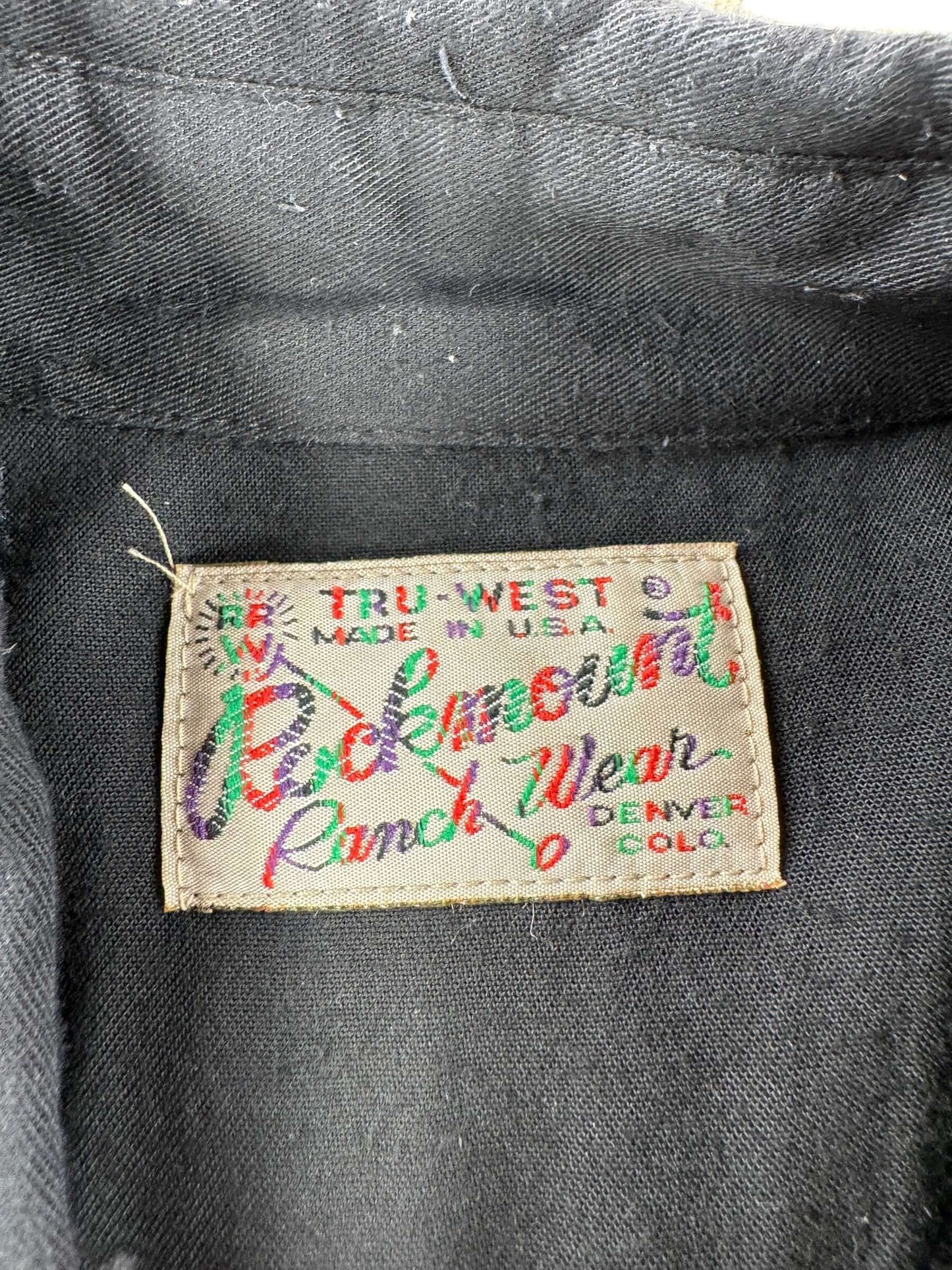 Tag on Vintage Rockmount Smile Pocket Rayon Pearlsnap SZ L