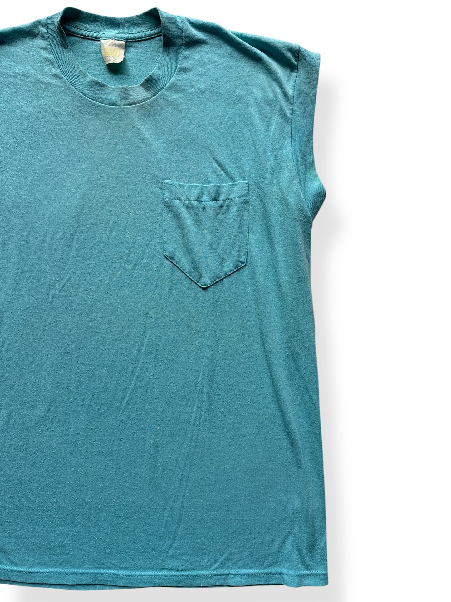 Front Left of Vintage Teal Sleeveless Pocket Tee SZ L