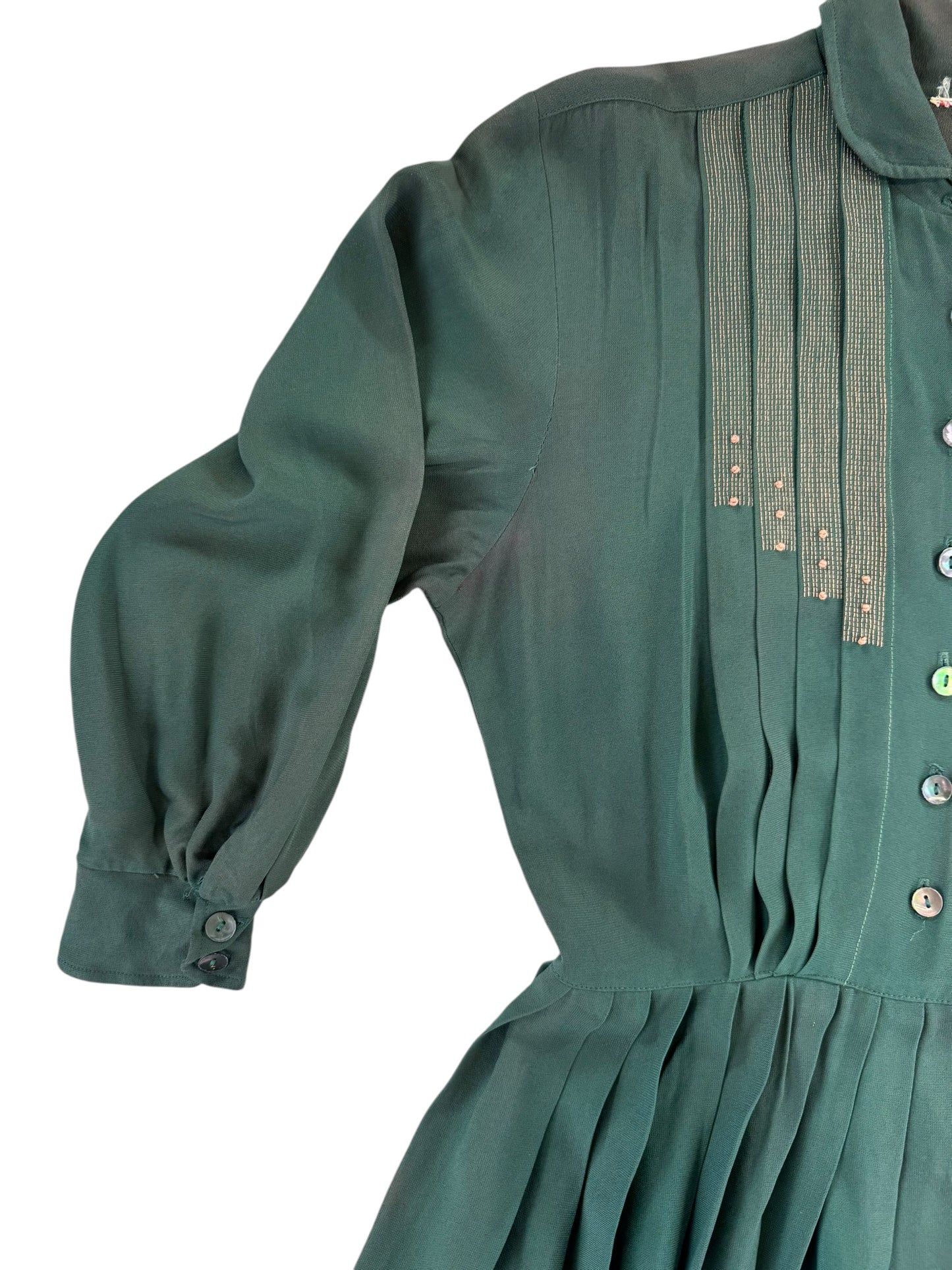 Front right shoulder of 1940s Green Rayon Pleated Dress M