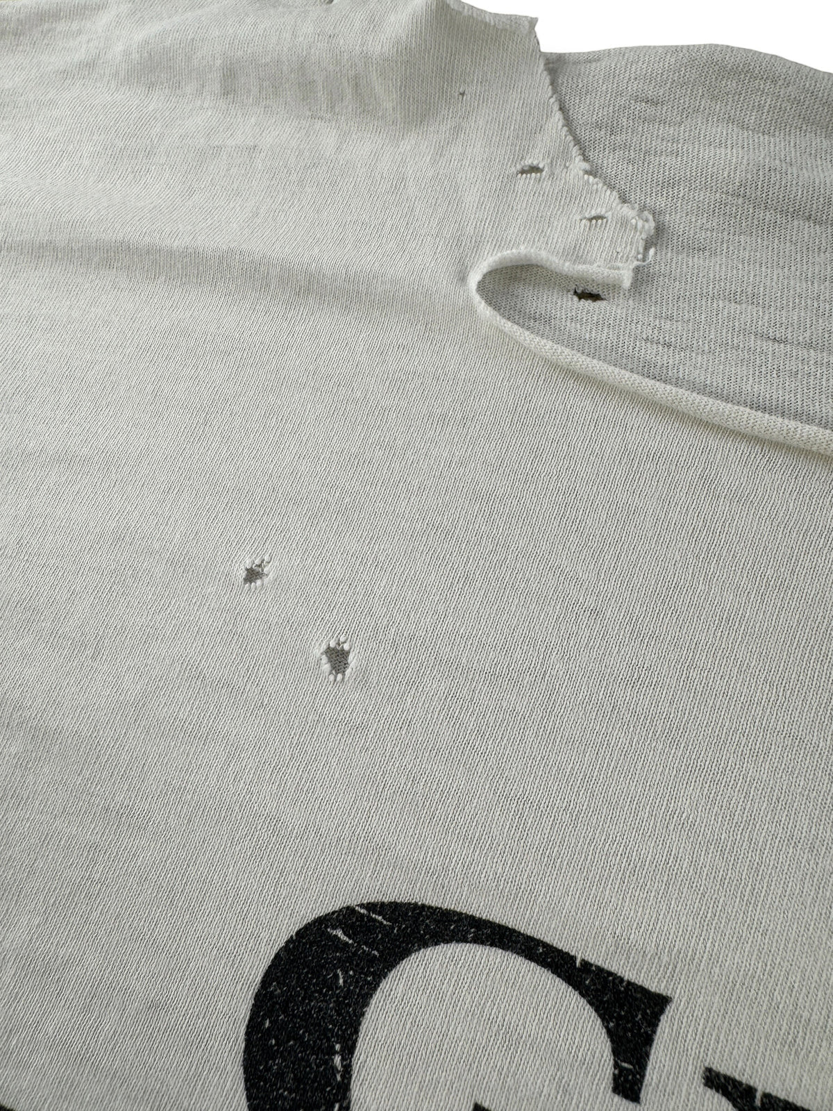 Small holes on Vintage Thrashed Give Racism The Boot Timberland Tee SZ XL