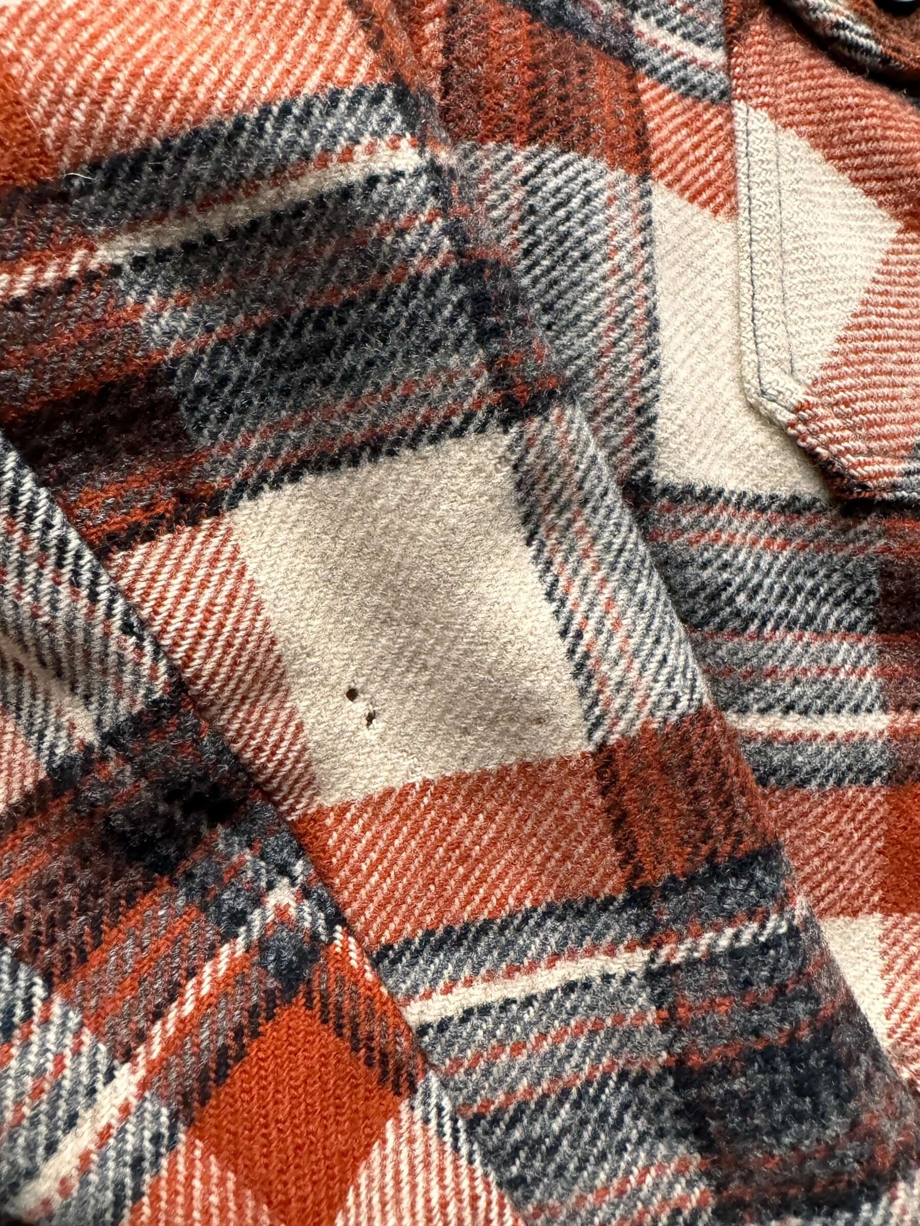 hole on right sleeve of Vintage Black Bear Orange Plaid Zip Up Wool Jacket SZ 46