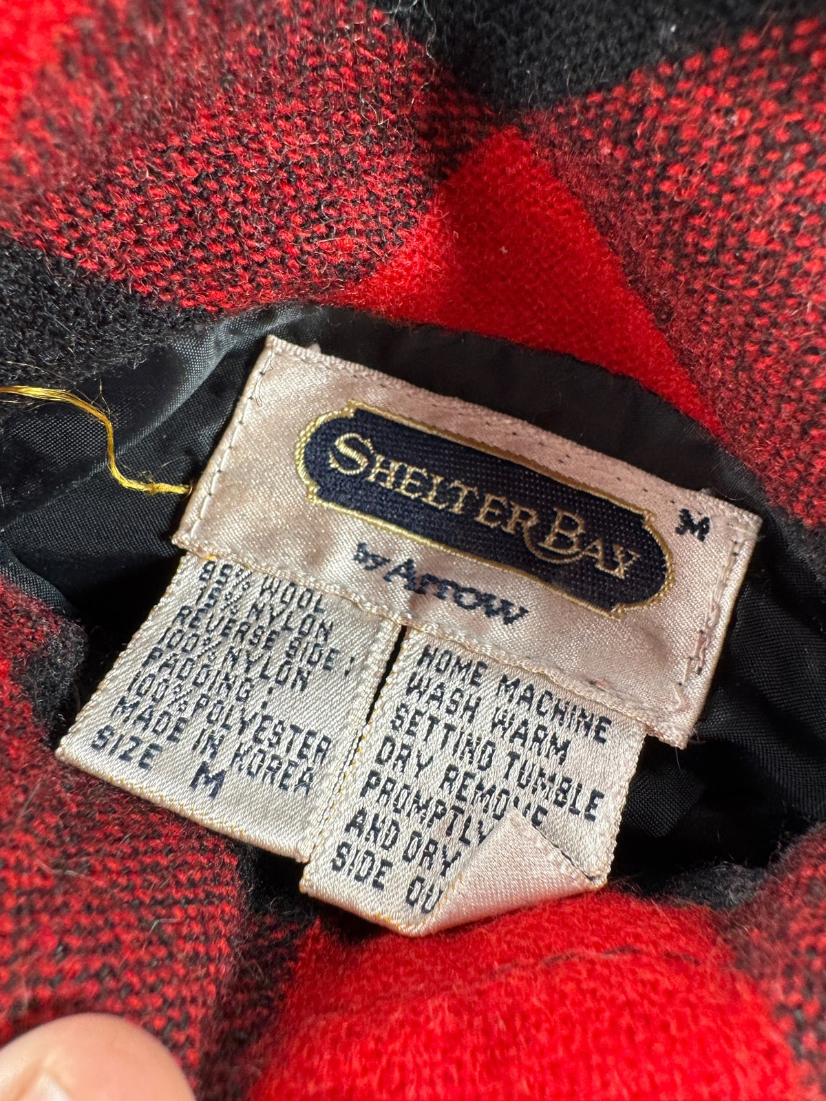 Tags on inside of pocket of Vintage Arrow Buffalo Plaid Down Vest SZ L