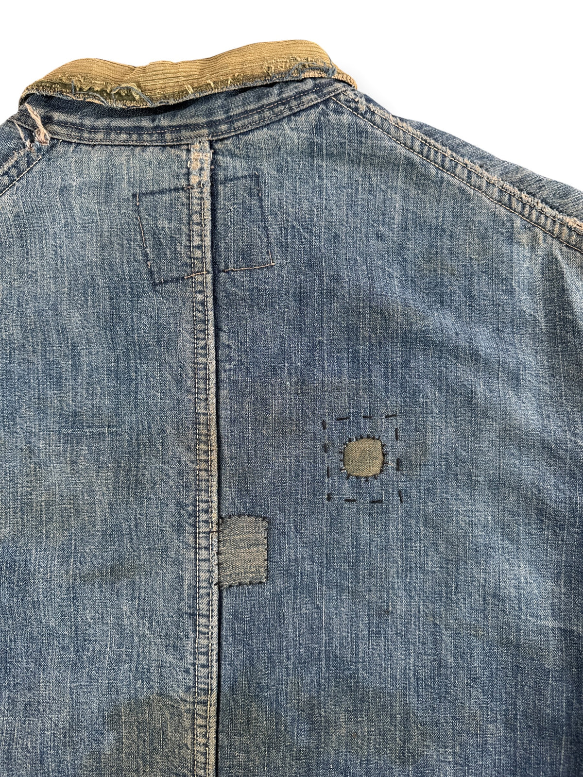 Repairs on back of Vintage 1940s Oshkosh Chore Coat SZ XL