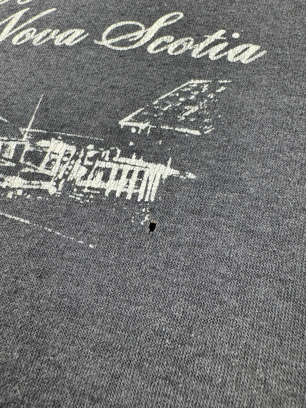 Small hole on front of Vintage Nova Scotia Tee XL