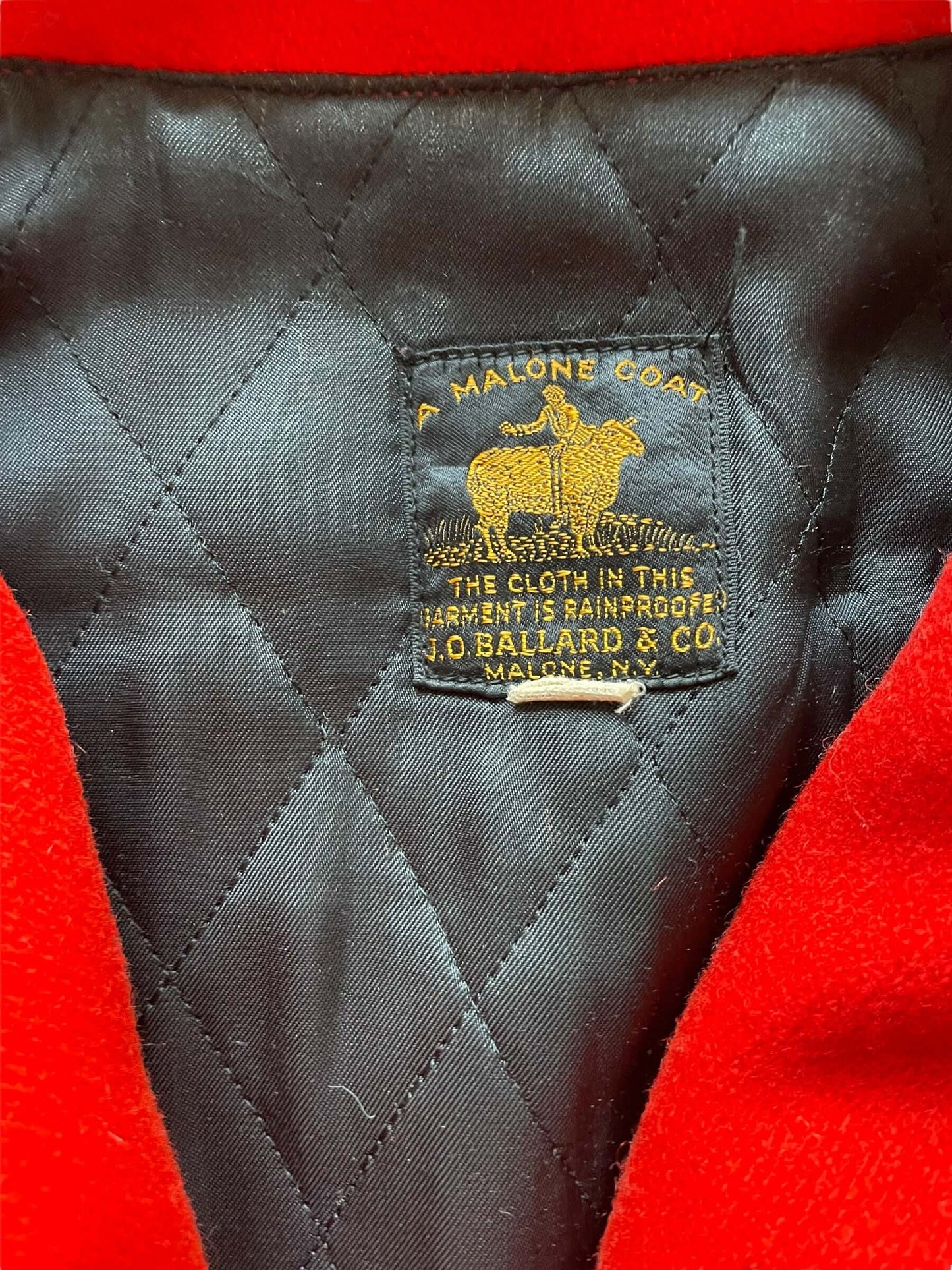 Tag view of 1940s J.O. Ballard & CO Red Wool Hunting Jacket