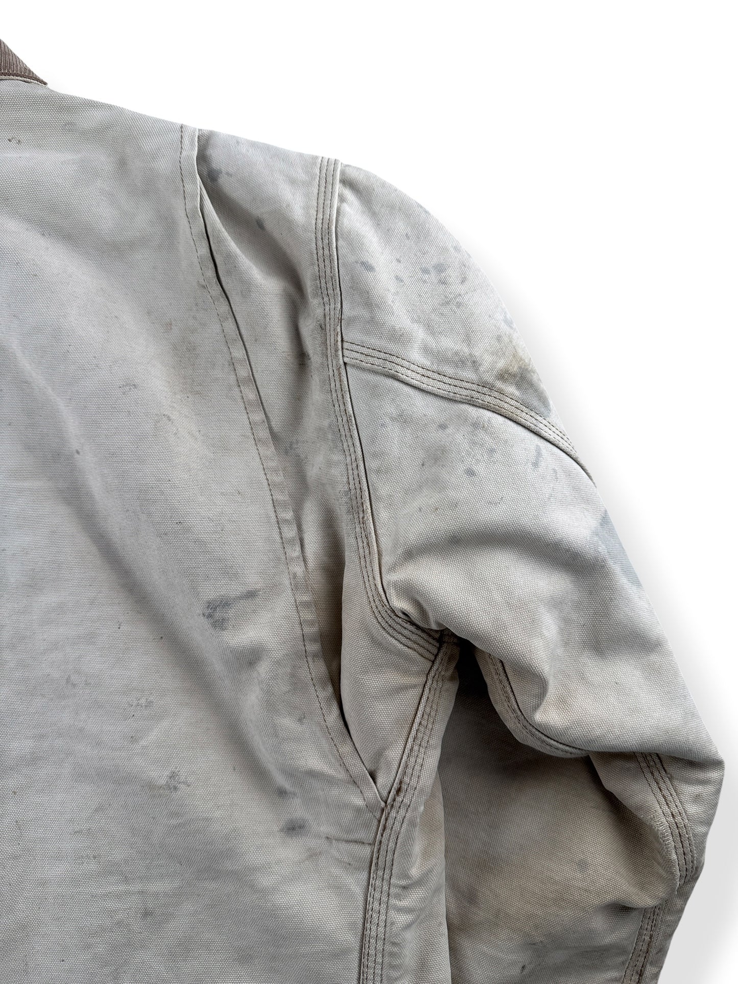 Ware on shoulder of Vintage 90’s Carhartt Faded Tan Detroit Jacket SZ XL