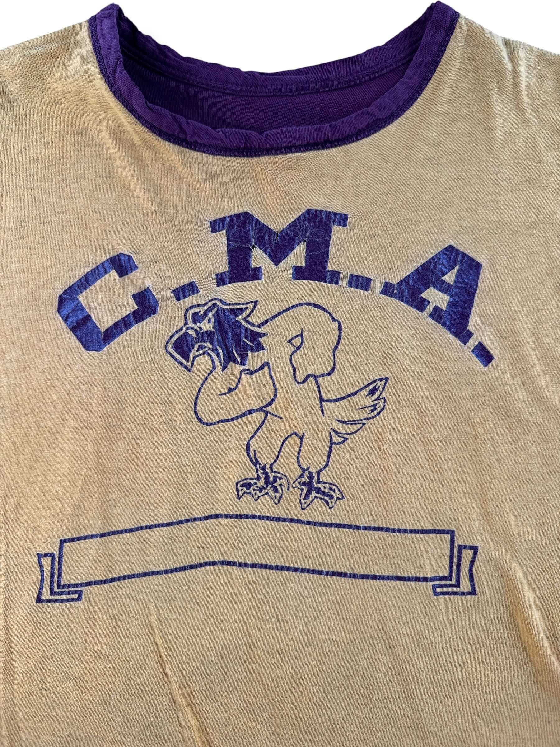 Front graphic on reverse side of Vintage Champion Blue Bar CMA Reversible Tee SZ L
