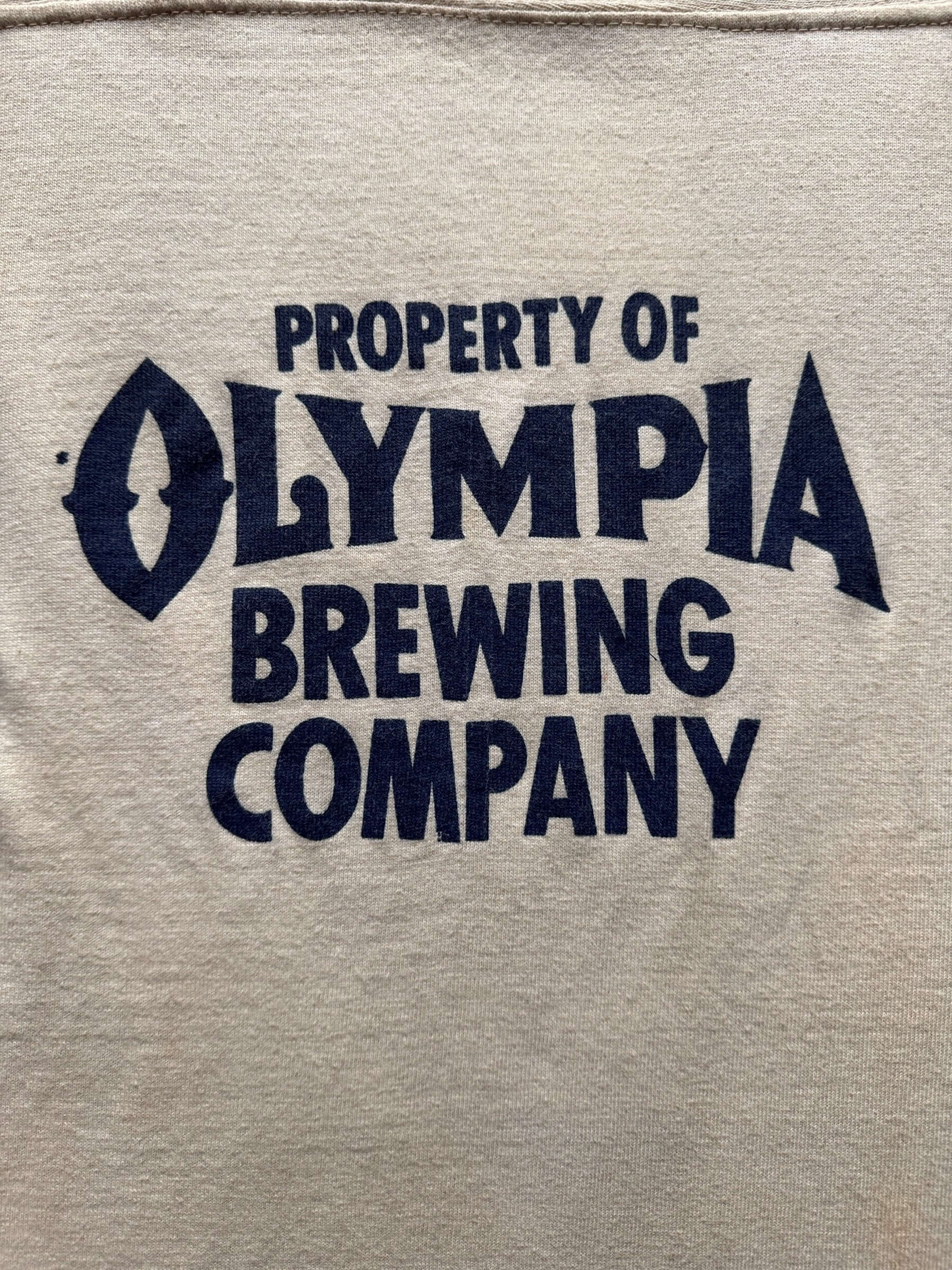 front graphic of Vintage Olympia Brewing Company Football Jersey SZ M