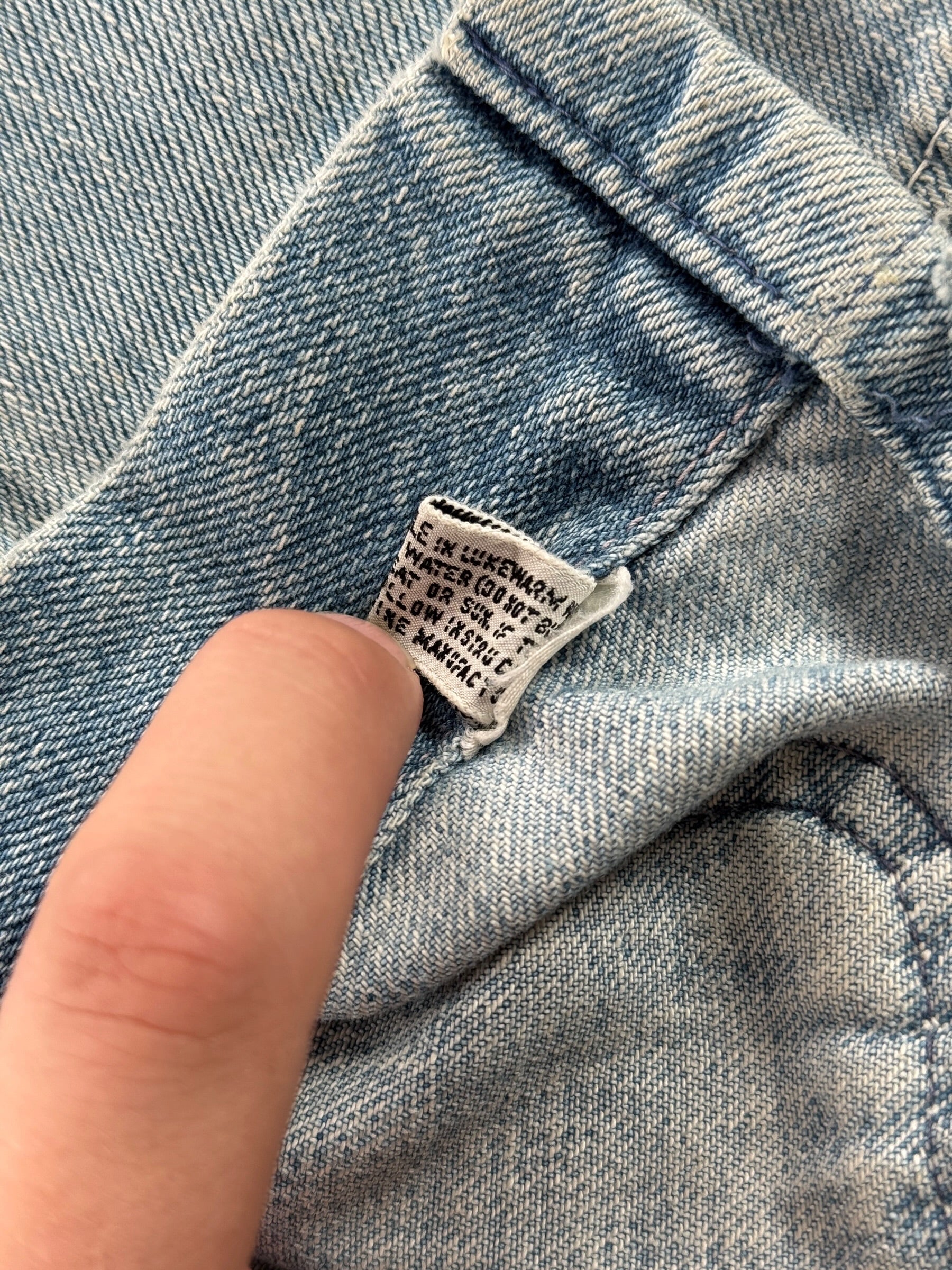 Back of inner care tag on Vintage 70s Two Tone Denim Chore Jacket SZ S