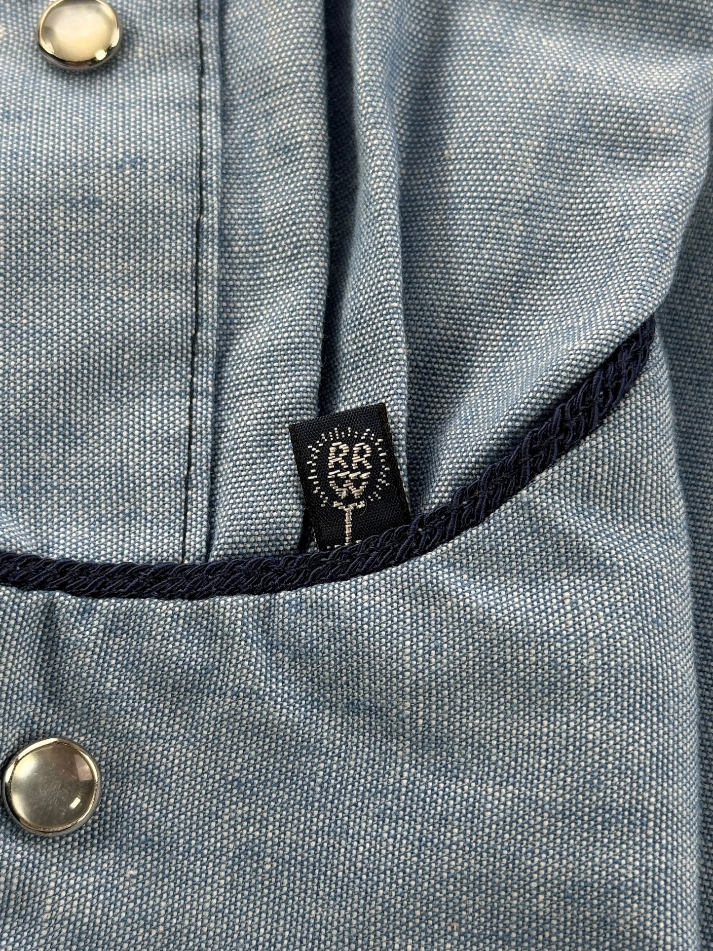 Cuff tag on Vintage Rockmount Ranch Wear Pearl Snap Chambray SZ 14 1/2