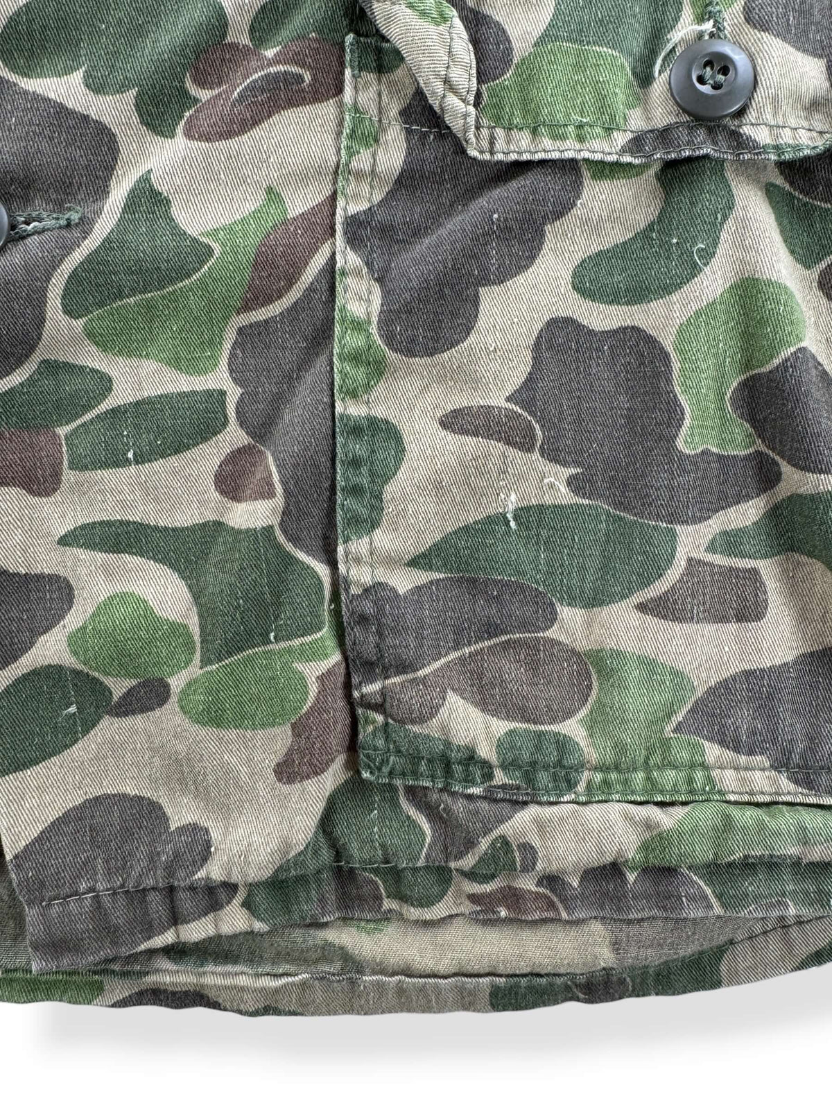 Wear on back of Vintage 1970s Ranger Camo Chore Jacket Z L
