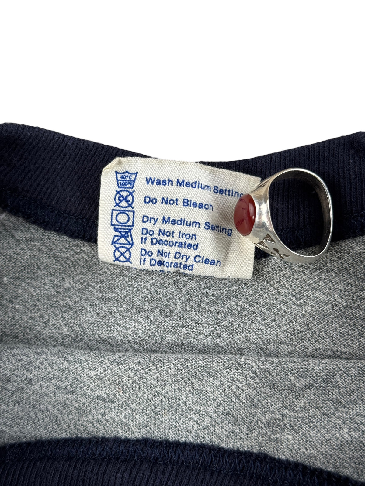 Back of tag on Vintage 1980s Washington Beware of Dawg Raglan Tee SZ M (Fits S)
