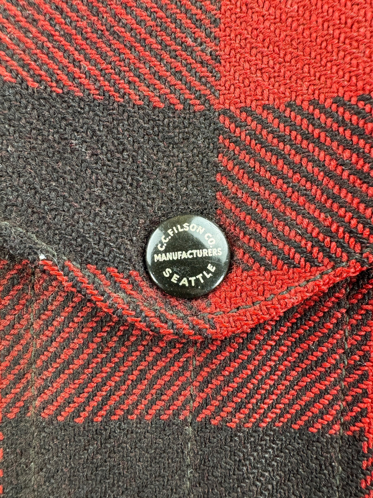 Enamel button on pocket of Vintage 40s Era Filson Wool Mackinaw Cruiser Jacket SZ L