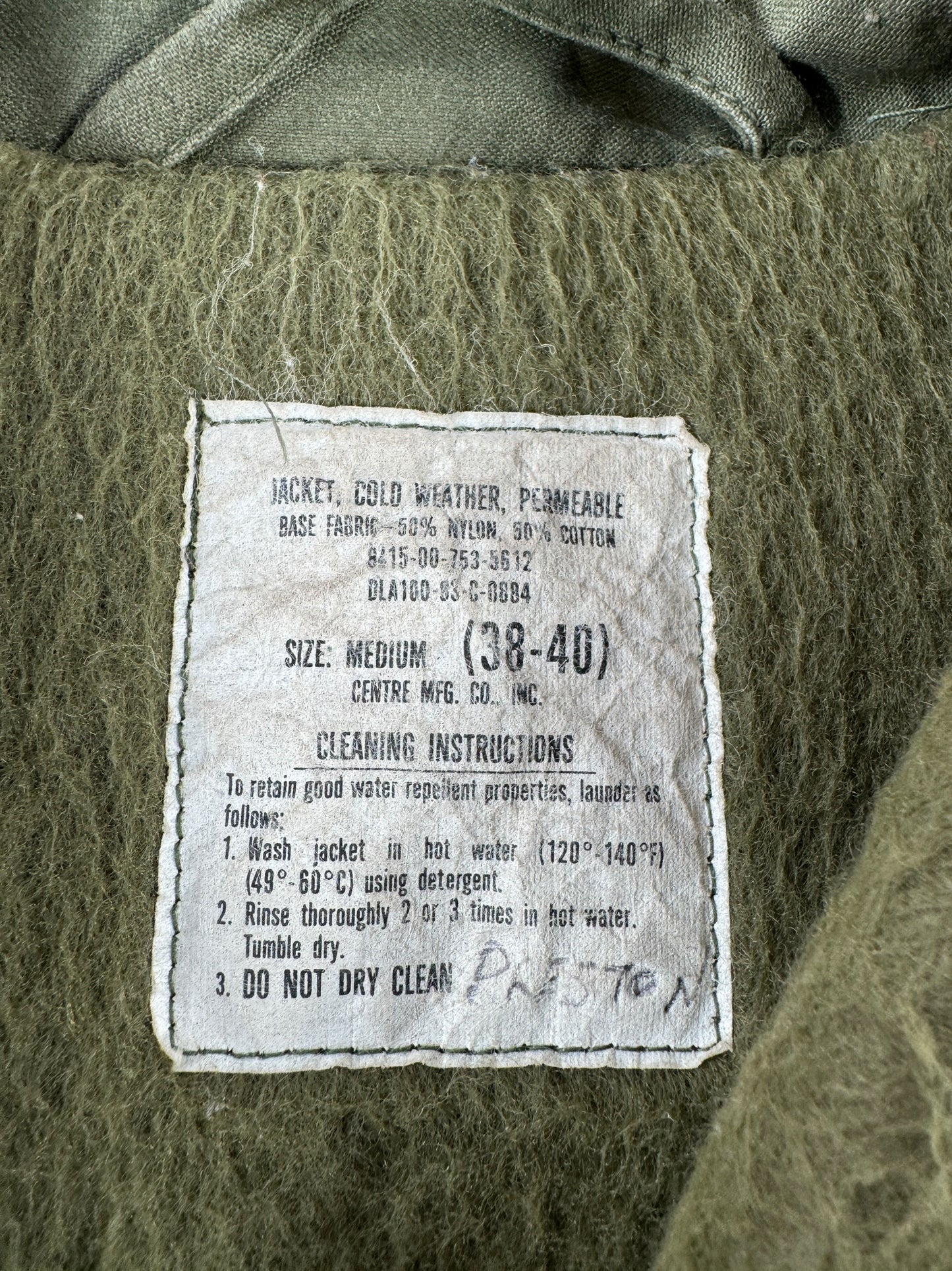 Tag on Vintage USN A-2 Cold Weather Deck Jacket SZ M