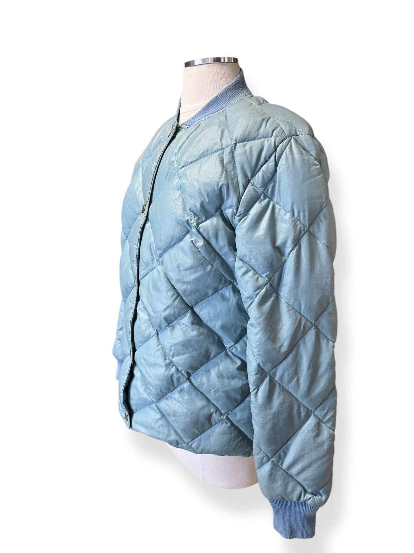 Side view of 80s Eddie Bauer Pale Blue Quilted Puffer Jacket M