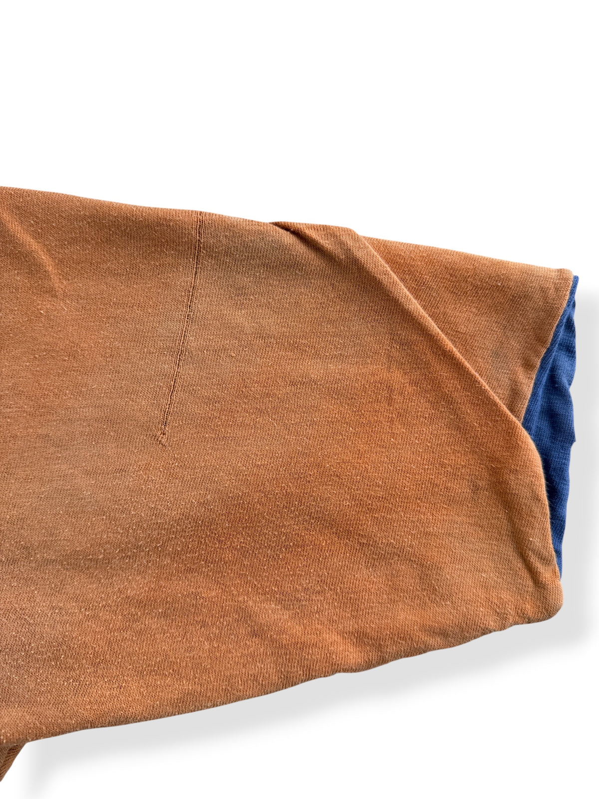 Fading on back sleeve of Vintage Orange / Blue Reversible Tee SZ M