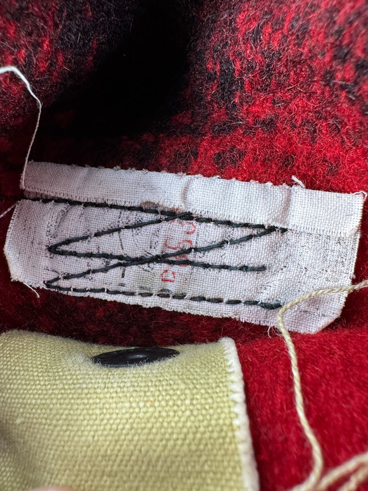 Union tag inside pocket on Vintage 40s/50s Filson 75% Red Hunter Jacket SZ 38