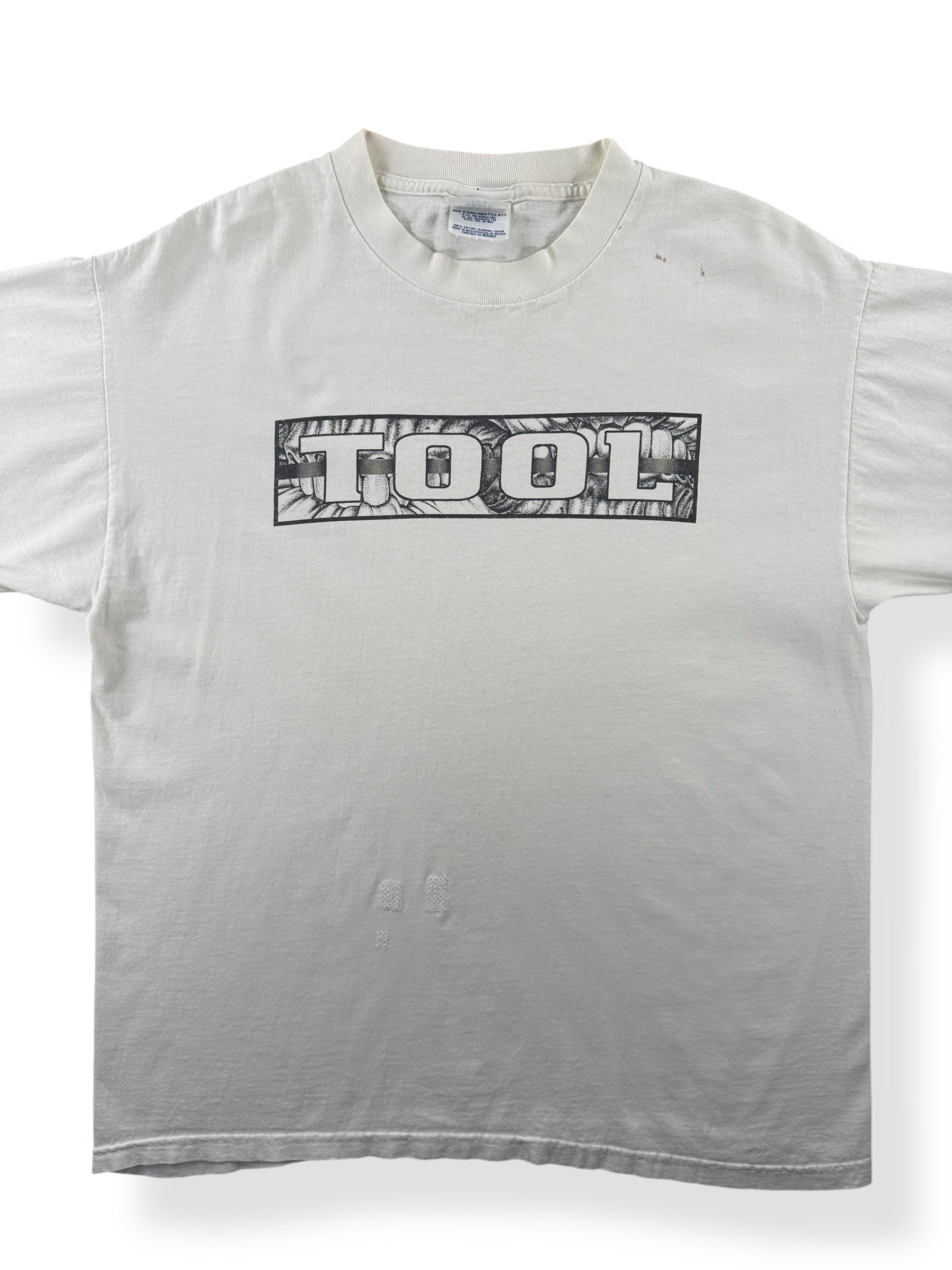 Front Close Up of Vintage 90s Tool Tee SZ L (Fits M)