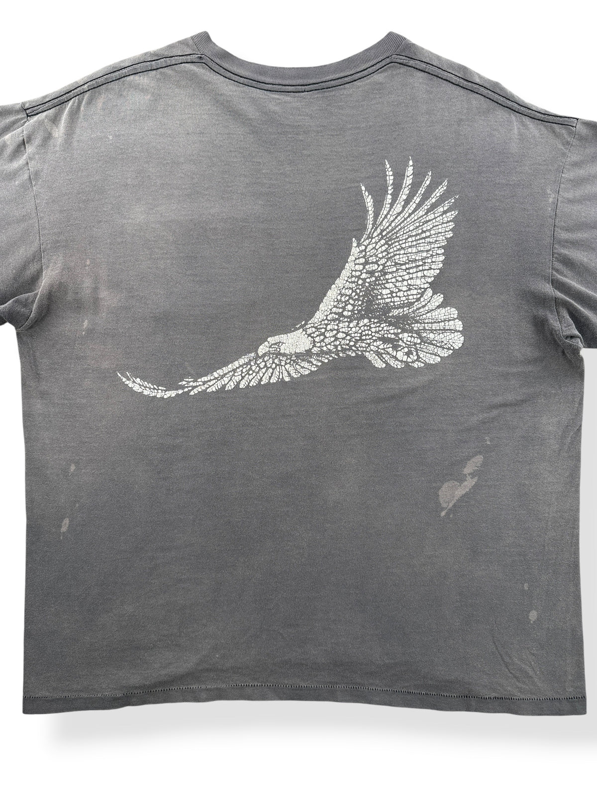 Close-up of the back of Vintage Smoked Out Winston Pocket Tee SZ XL