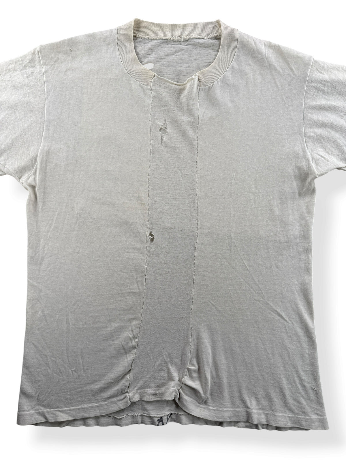 Close-up of Vintage Heavily Repaired Blank White Tee SZ M