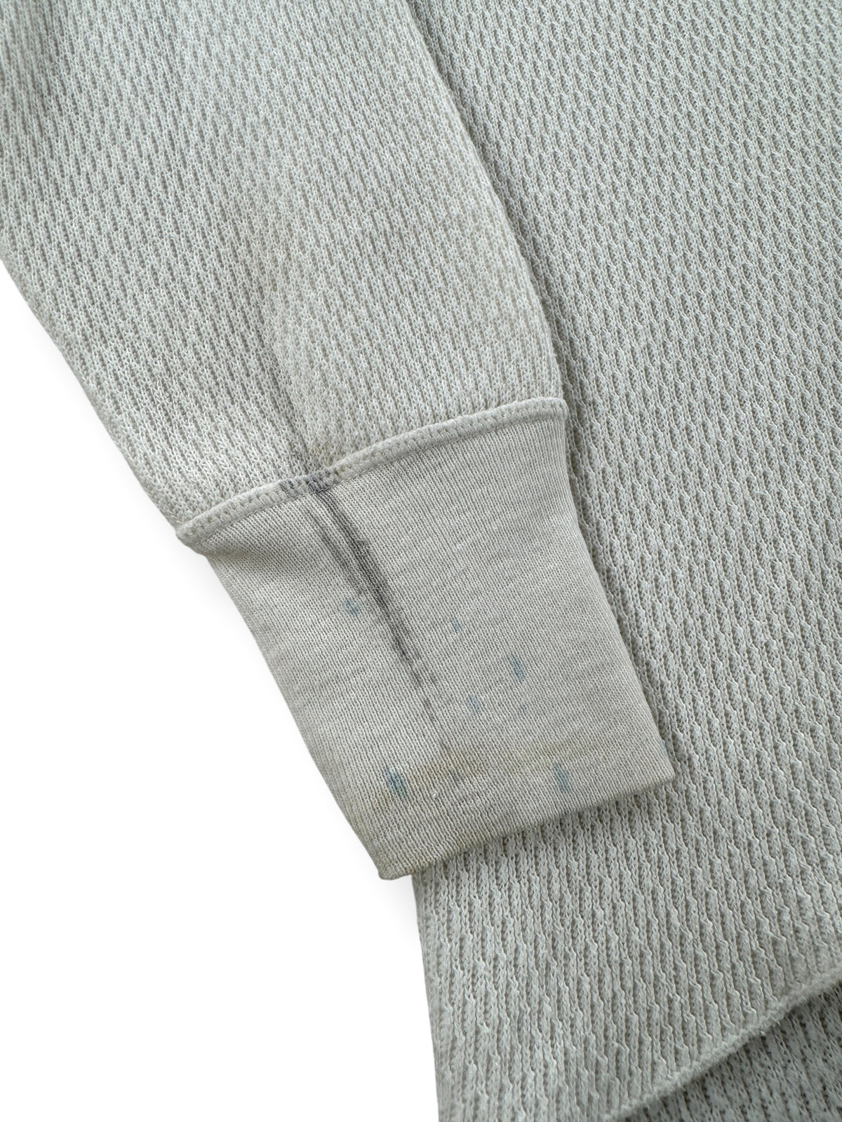 Ware on cuff of Vintage 80s Waffle Thermal Shirt SZ M