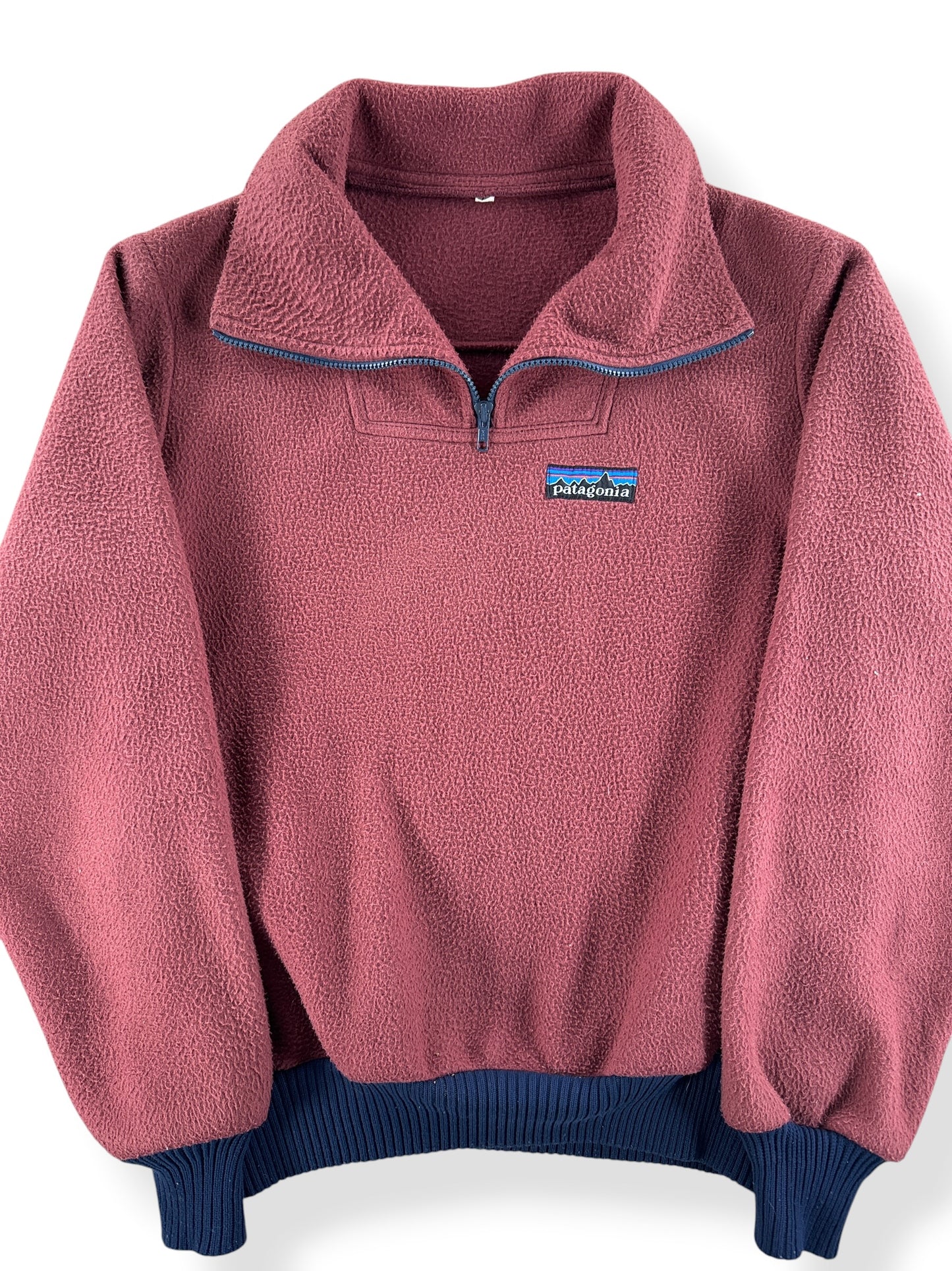 Front Close Up of Vintage Patagonia Light Red Synchilla Zip Up Jacket SZ L
