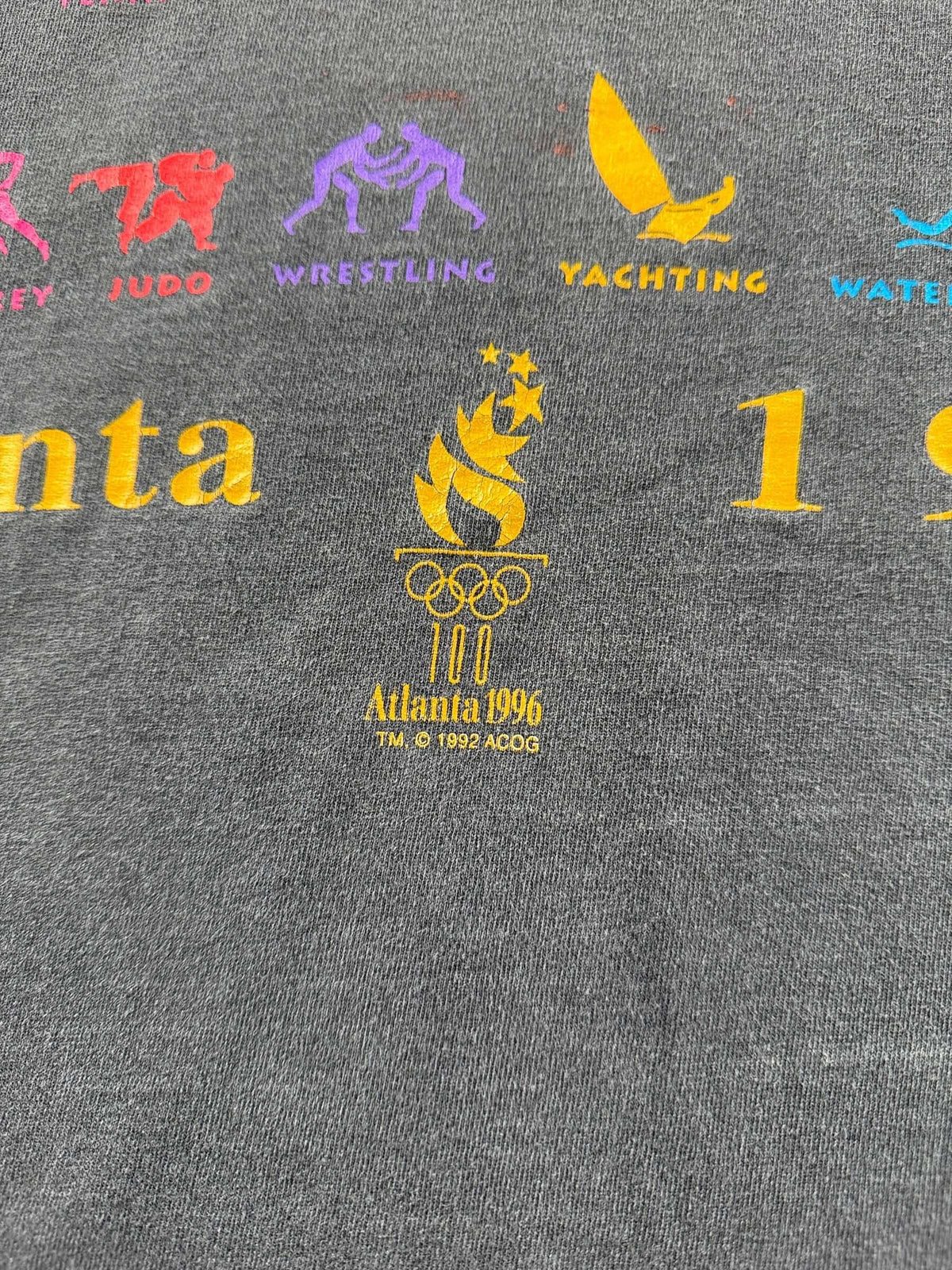 1992 Copyright on Vintage 1996 Olympics Faded Black Tee SZ M