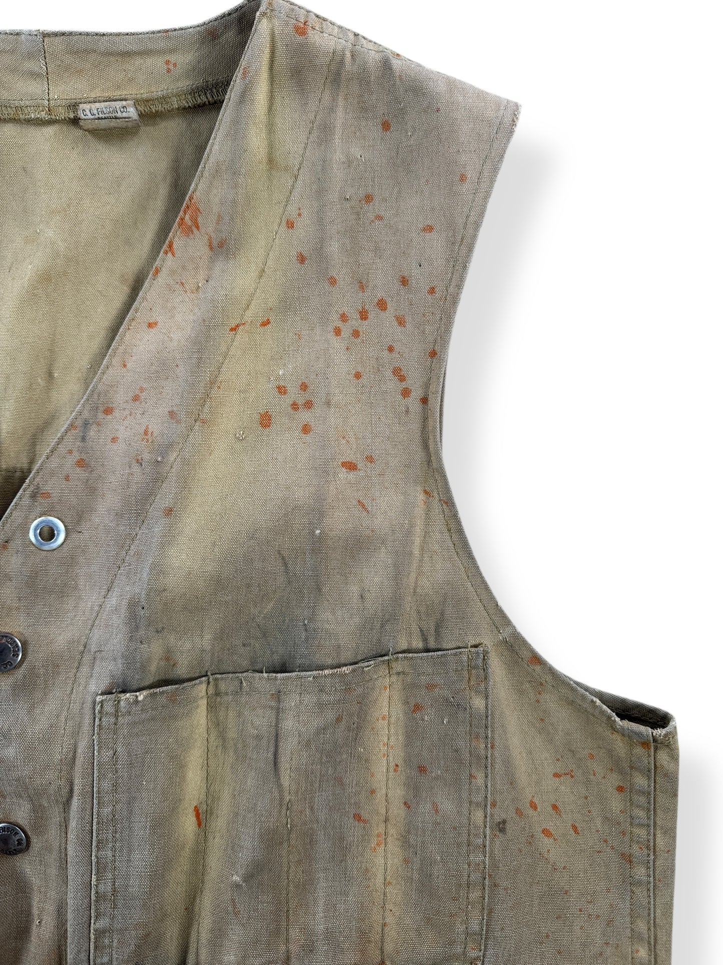 Stains on Vintage Filson Tin Hunting Vest Button Sample SZ 40