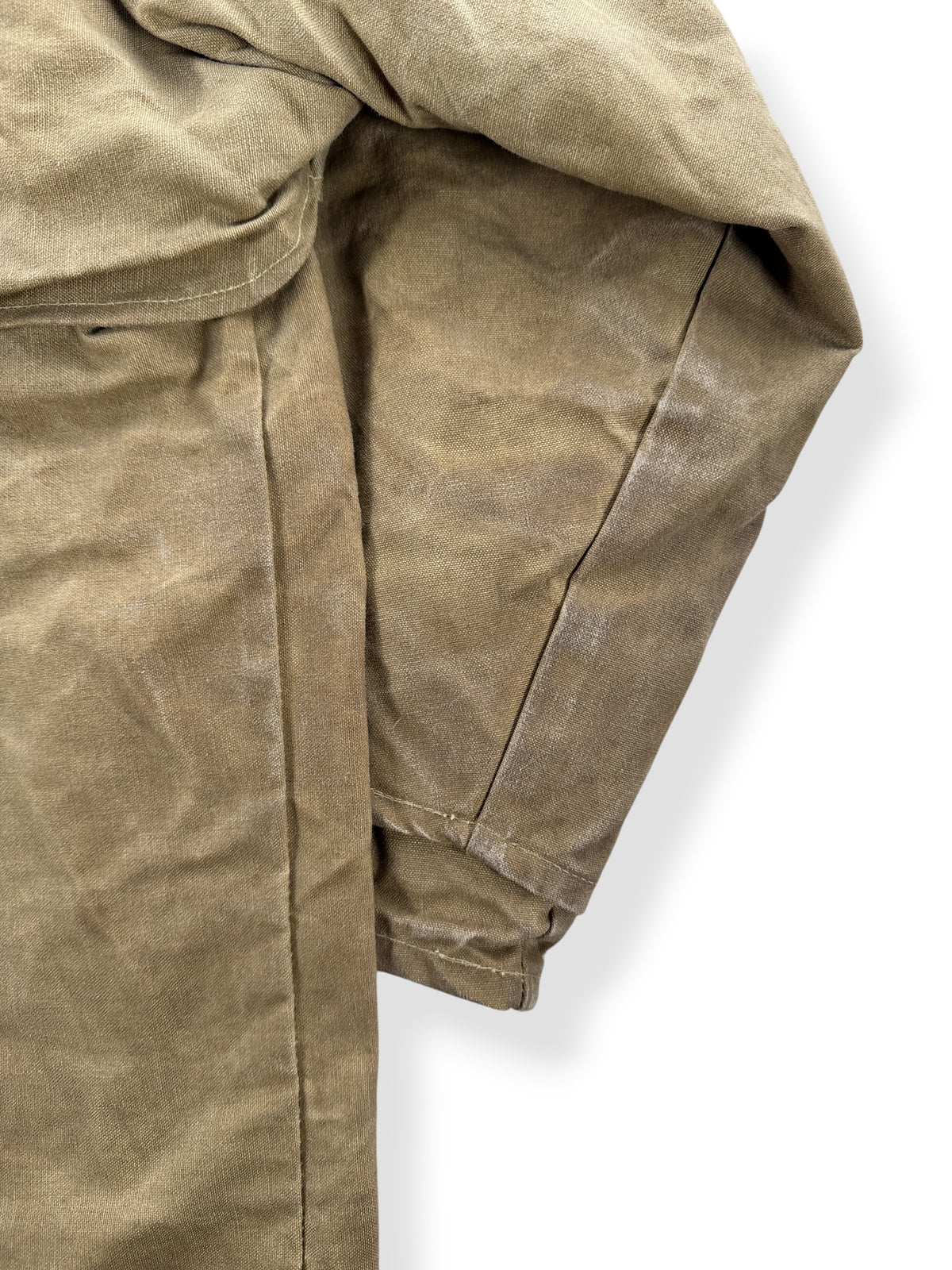 Ware on back of sleeve of Vintage Filson Double Tin Jacket SZ L