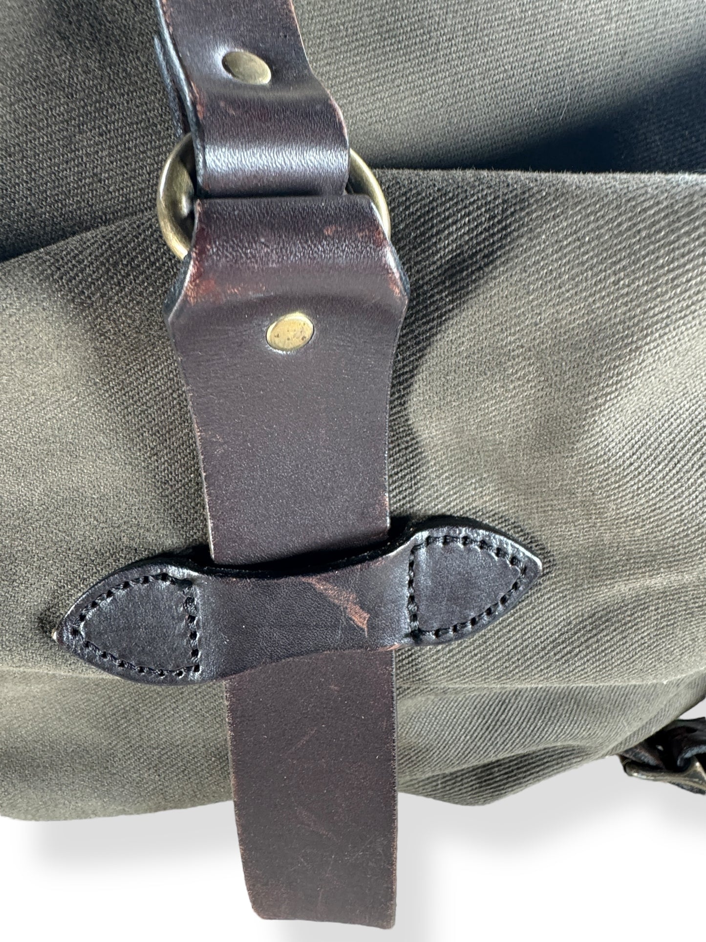 Alternate Scuff on Leather of Filson Otter Green Rugged Twill Medium Duffle